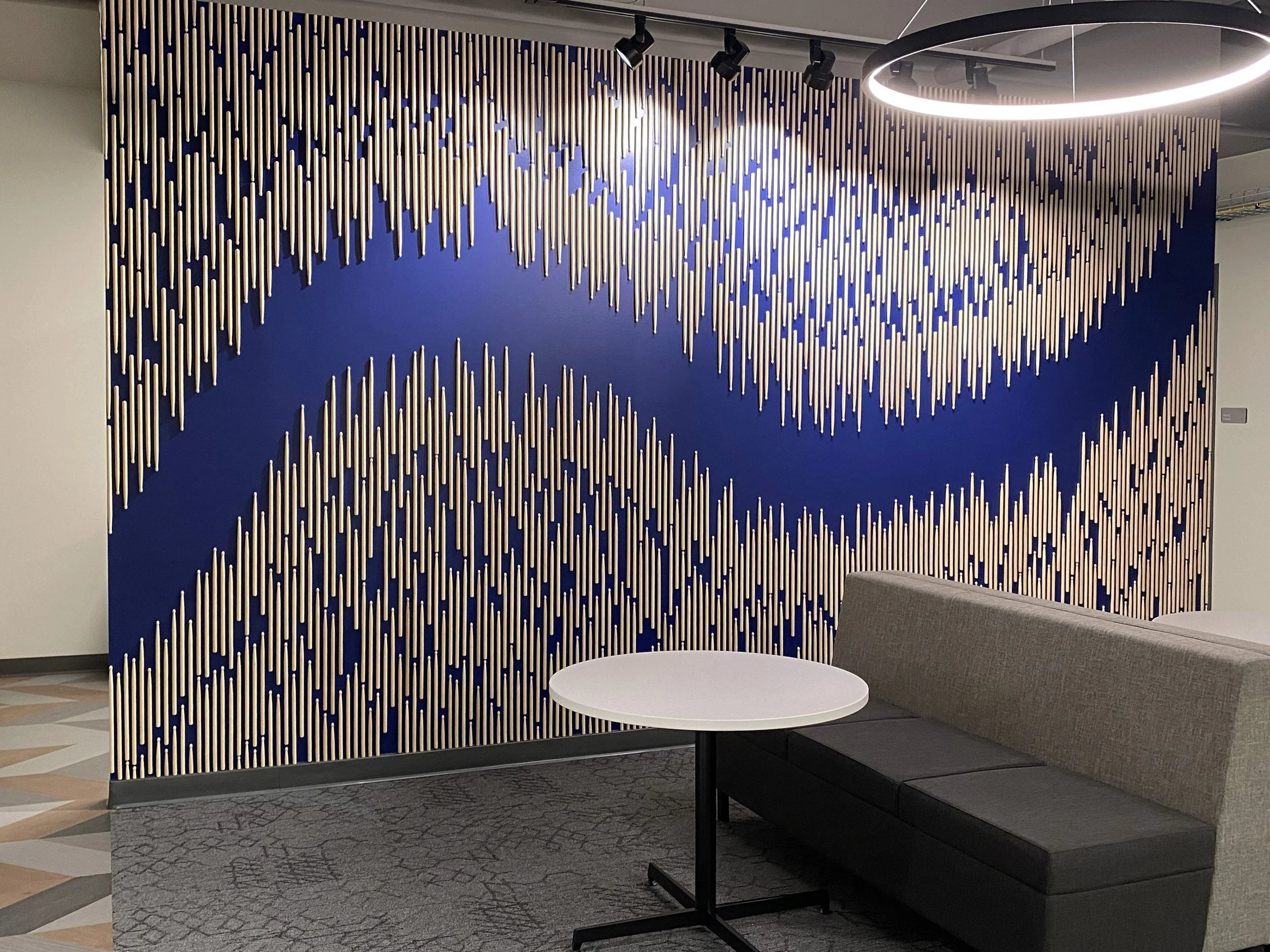 09_McCombs_Wave_Drumsticks_Hubbard Radio Lobby.jpg