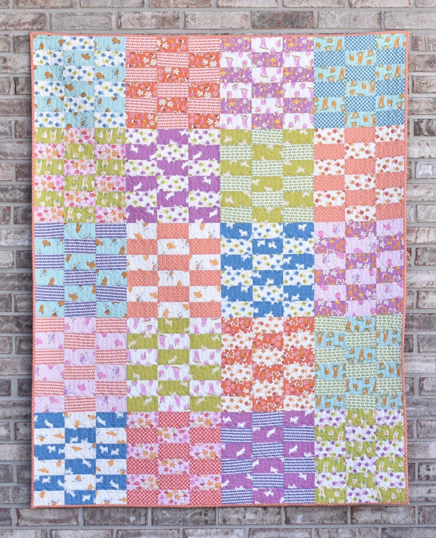 Sharing one of my favorite makes from this year again! The Animal Animal collection from @rubystarsociety is just the cutest and it's so fun to create with. I love the way all the bright colors worked together in this quilt. It's bright, but still ba