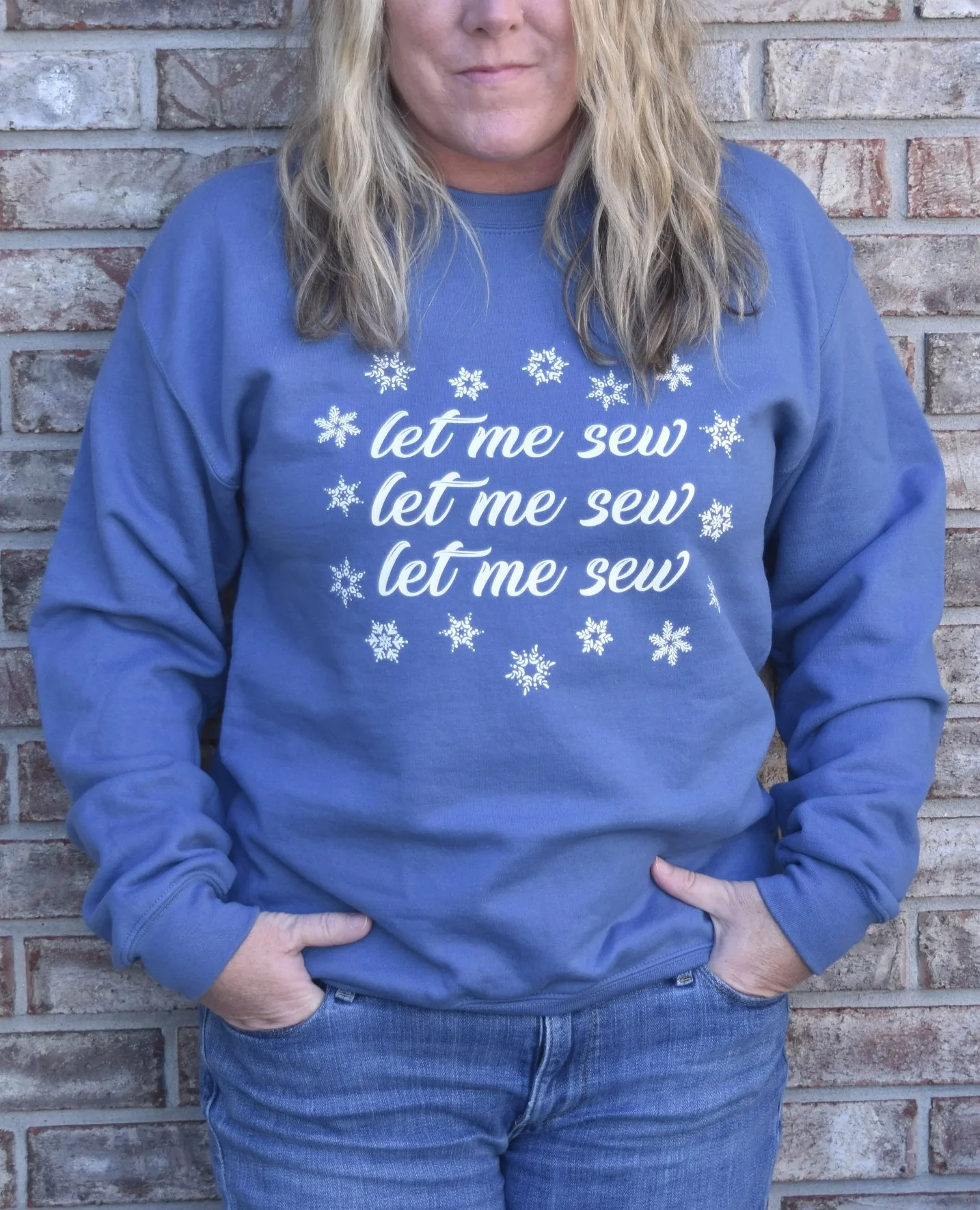 My wardrobe now that it's officially ❄️DECEMBER❄️!!⁠
⁠
Let it snow &amp; let me SEW! ⁠
⁠
I love this cozy sweatshirt &amp; tee. You can get one for yourself or a quilty friend in my shop! This design comes in many different colors. Comment SHOP for a