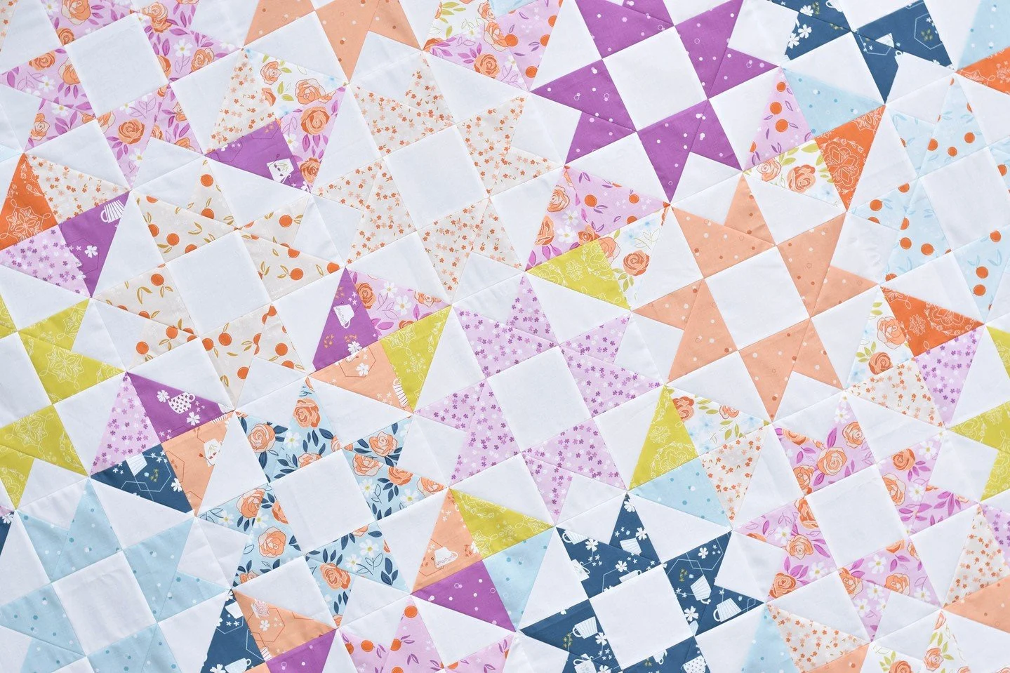 Don't mind me...just admiring this beauty a bit more 🤩 I can't wait to get back home this weekend and start quilting!⁠
⁠
Fabric: Homage by @cottonandjoy for @rileyblakedesigns⁠
⁠
Pattern:  Amberlight II - tutorial available on my website