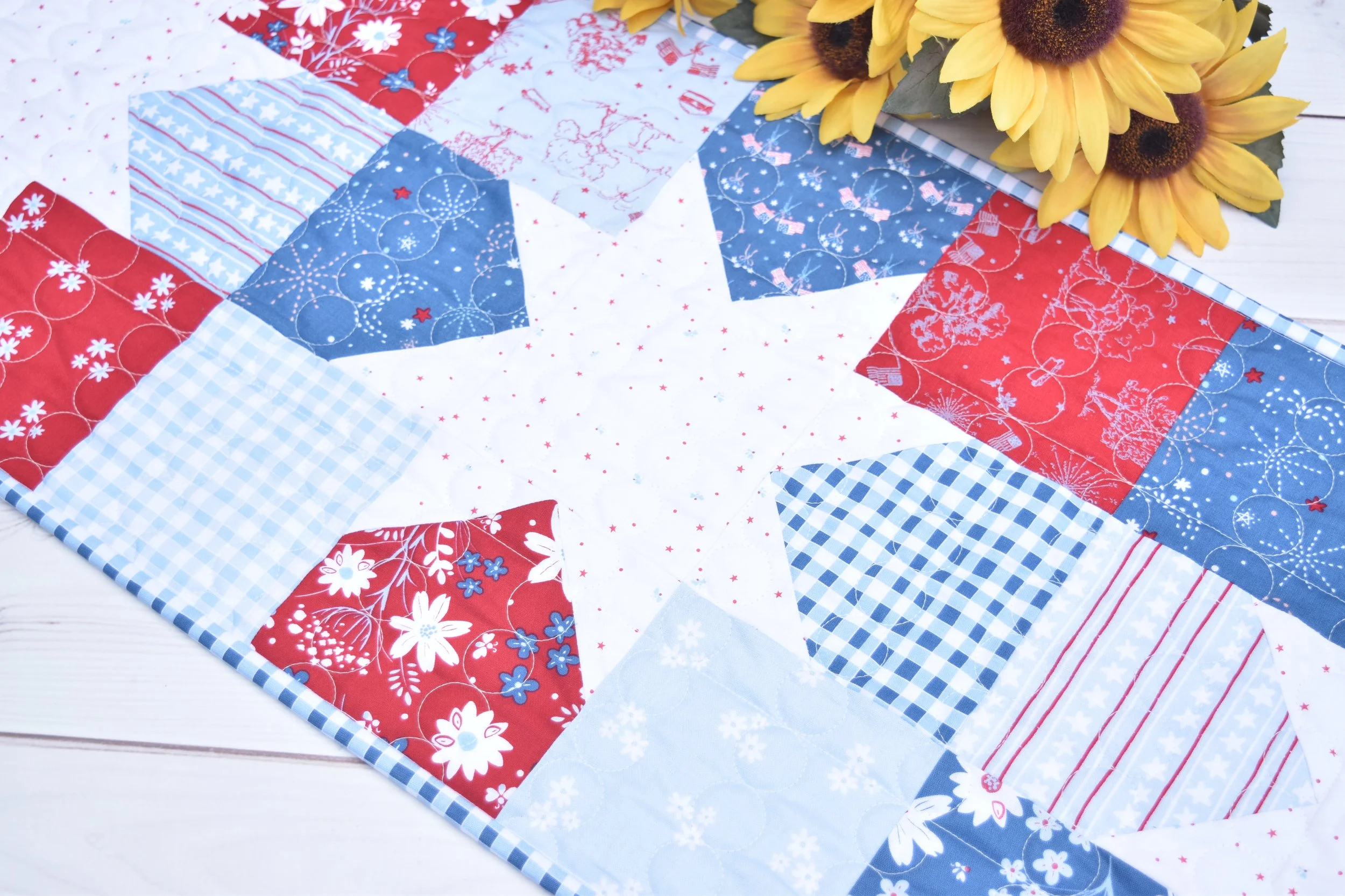 Star Charms table runner by Amanda Castor of Material Girl Quilts