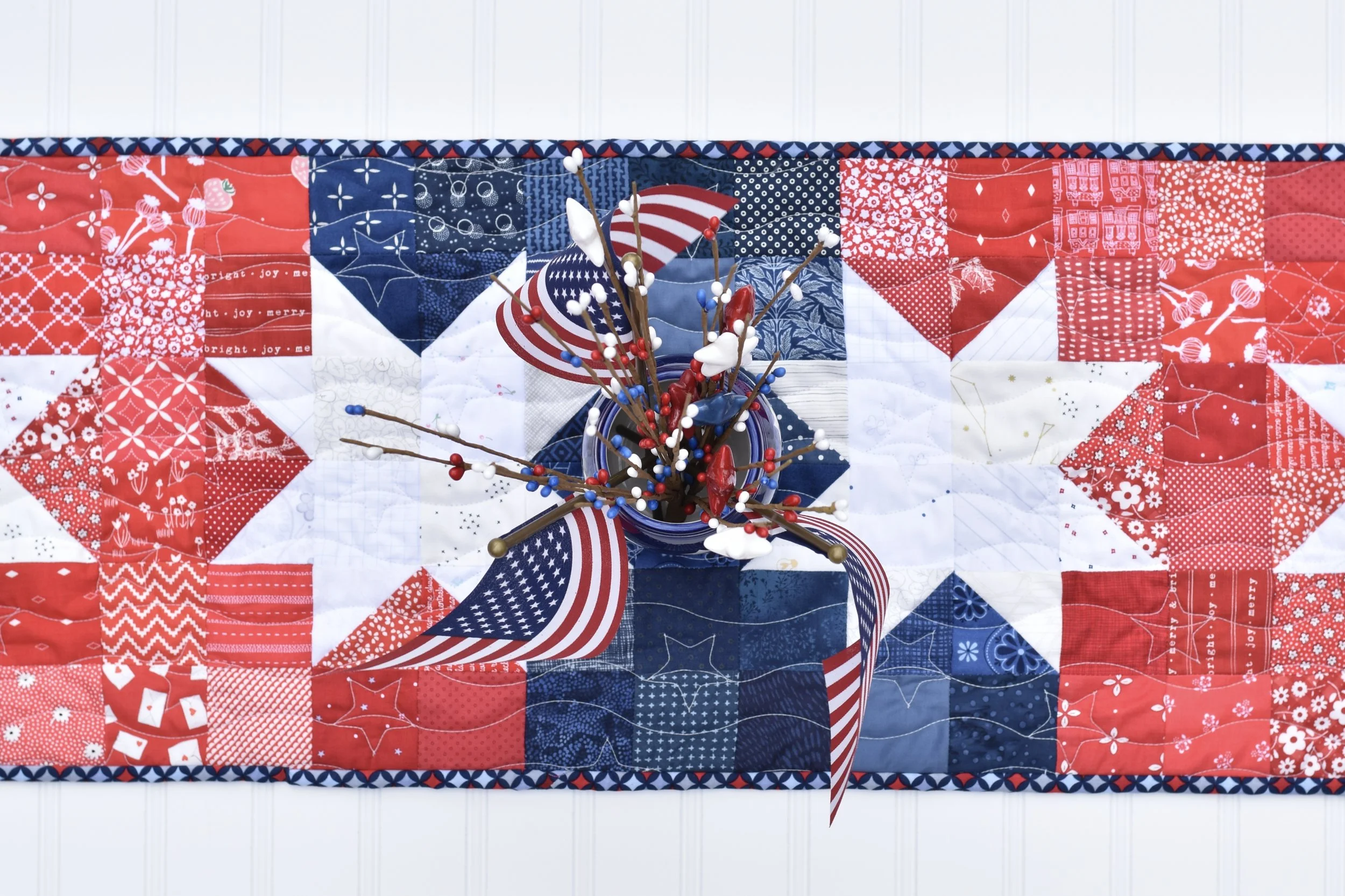 Liberty Lights table runner by Amanda Castor of Material Girl Quilts