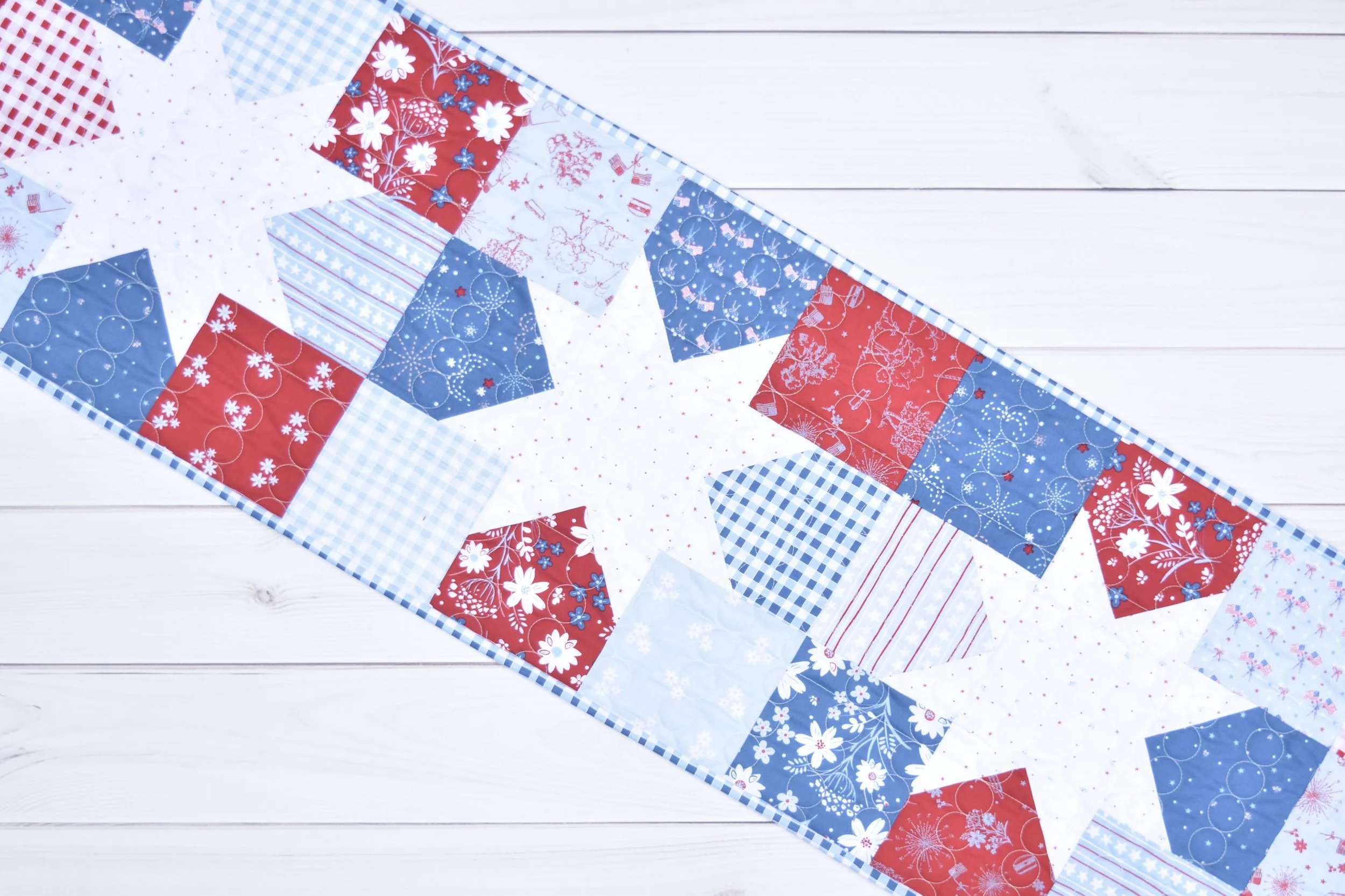 Star Charms table runner by Amanda Castor of Material Girl Quilts