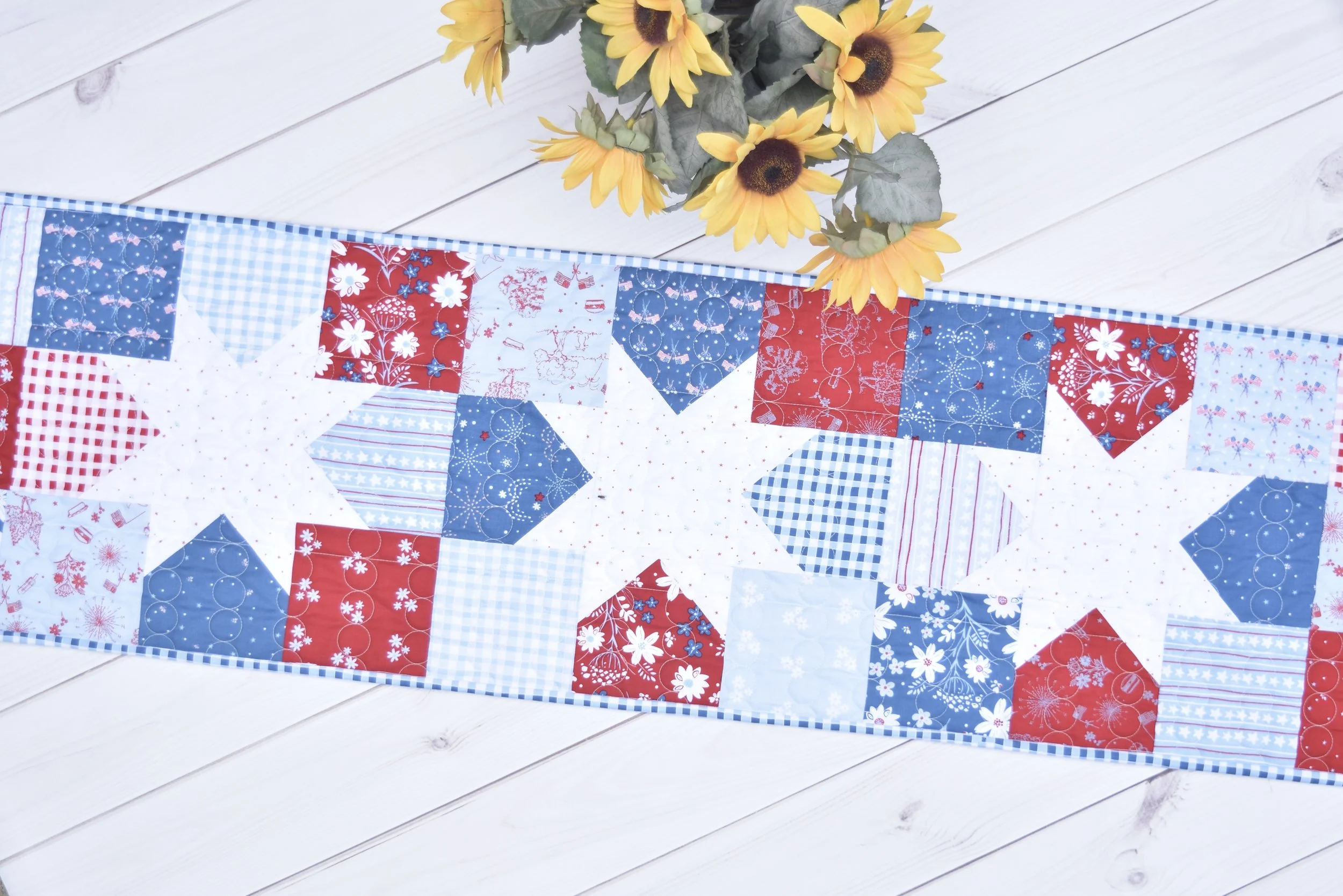 Star Charms table runner by Amanda Castor of Material Girl Quilts