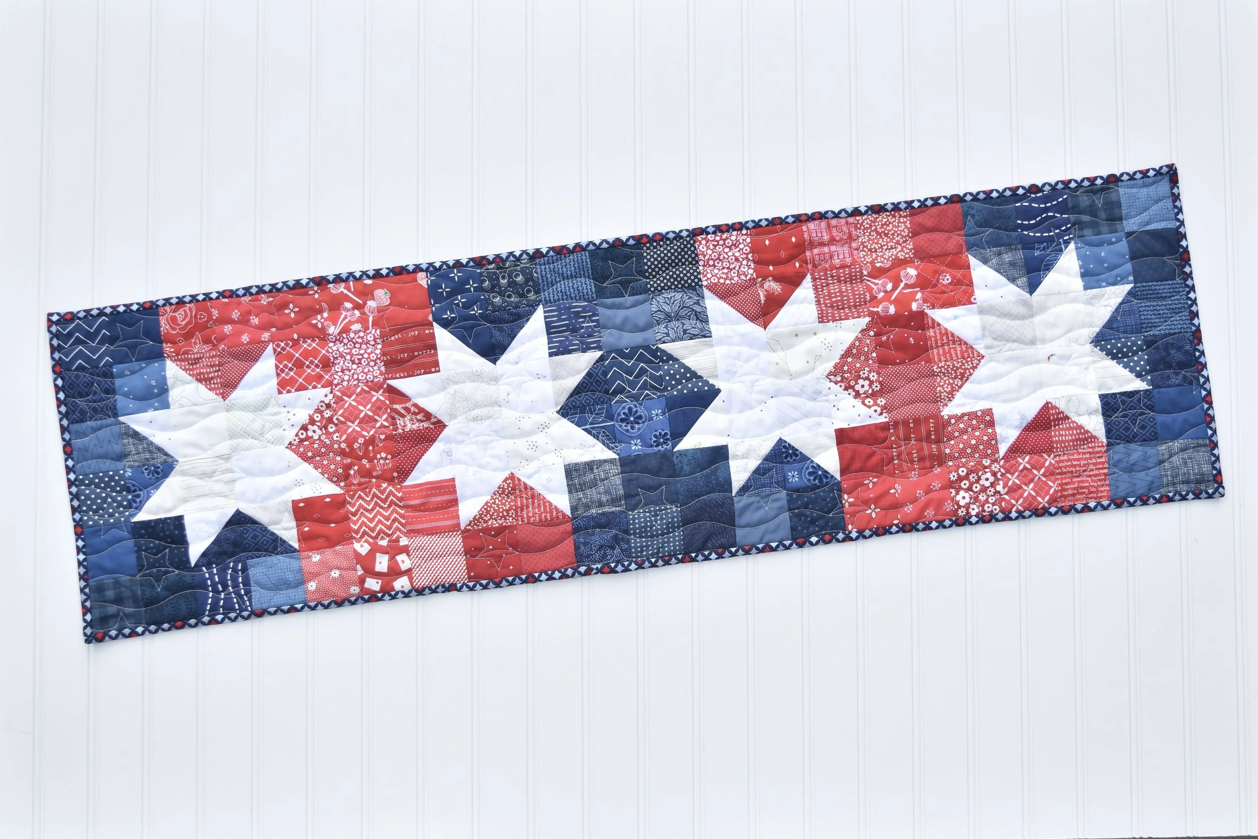 Liberty Lights table runner by Amanda Castor of Material Girl Quilts