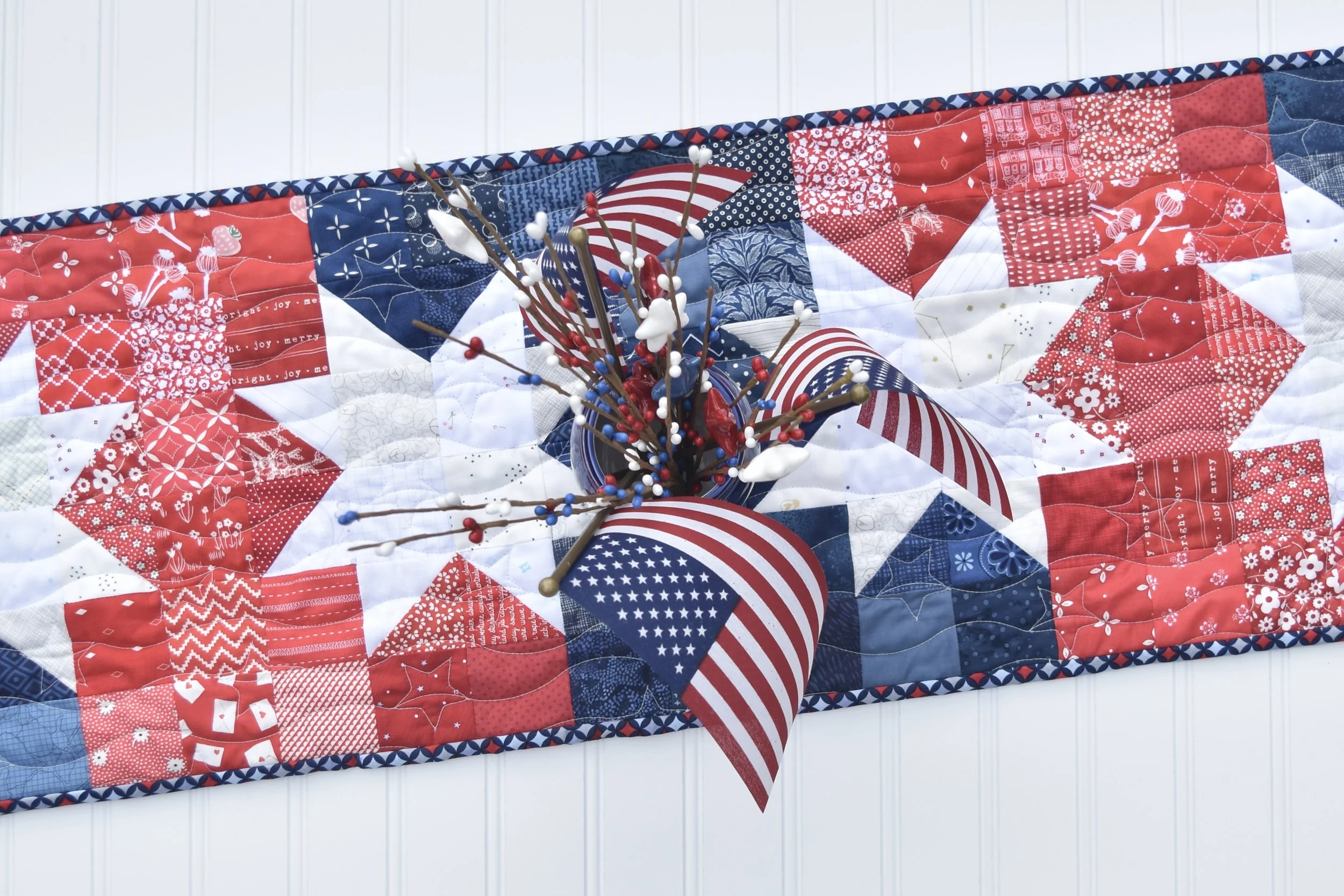 Liberty Lights table runner by Amanda Castor of Material Girl Quilts