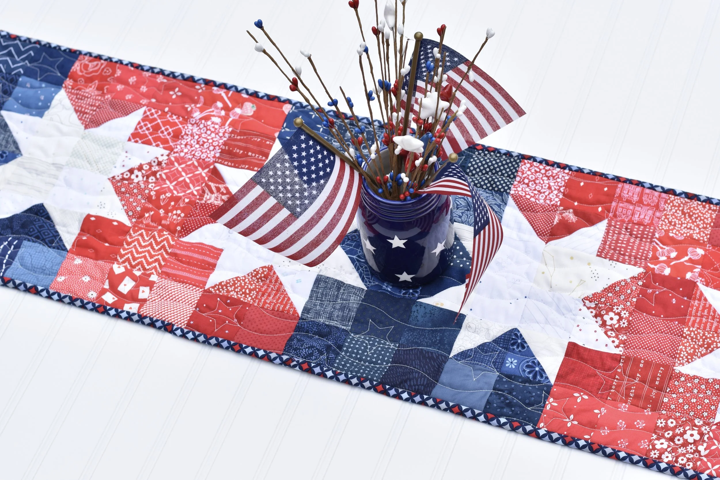 Liberty Lights table runner by Amanda Castor of Material Girl Quilts