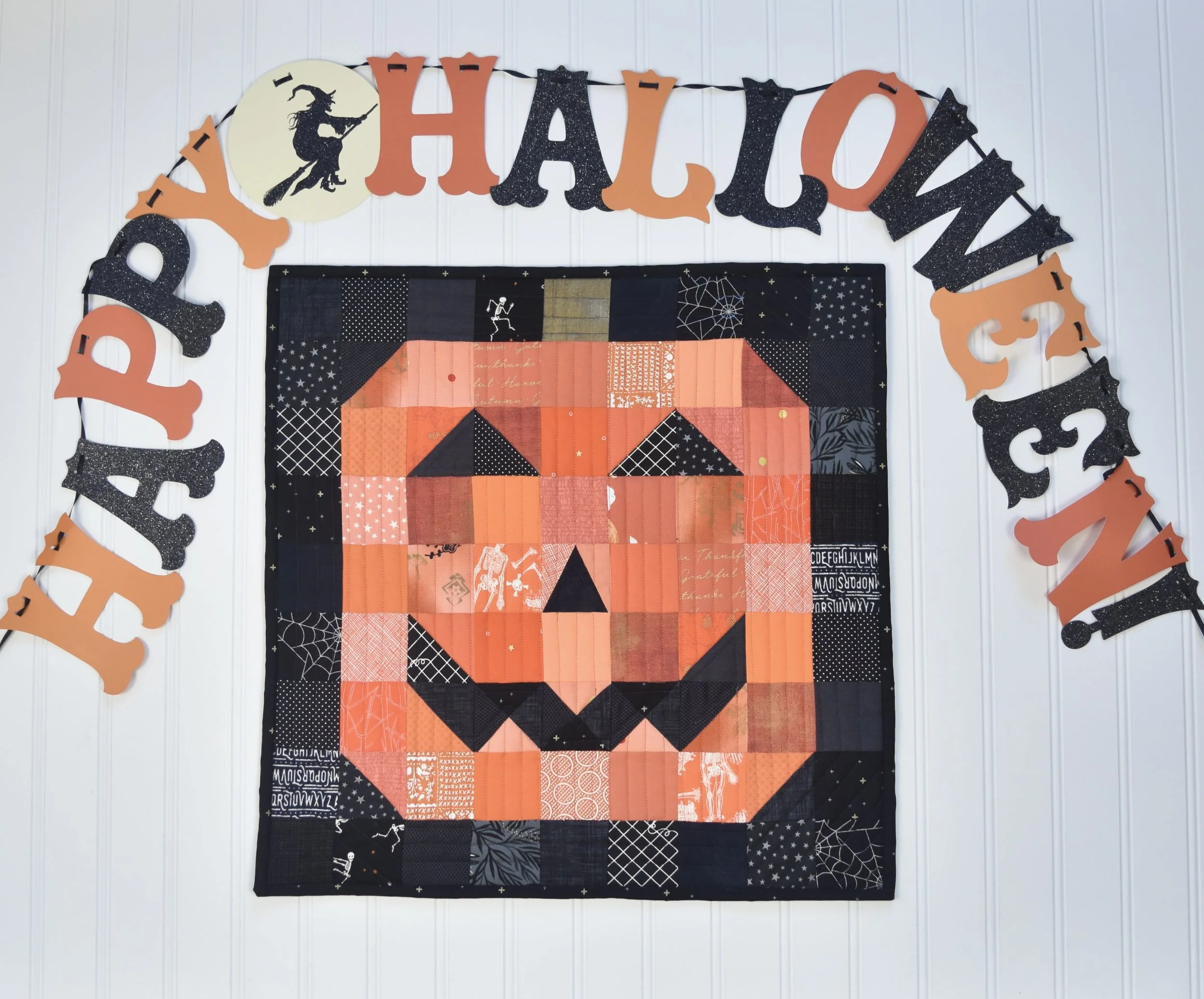 Scrappy Jack quilt by Amanda Castor of Material Girl Quilts
