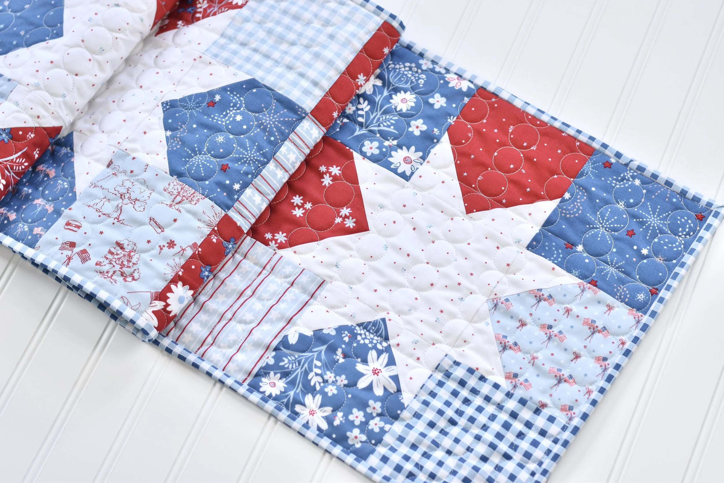 Star Charms table runner by Amanda Castor of Material Girl Quilts