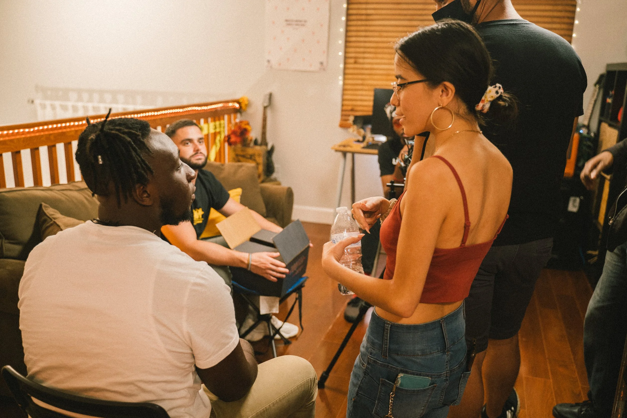 Mimi speaking with crew.JPG