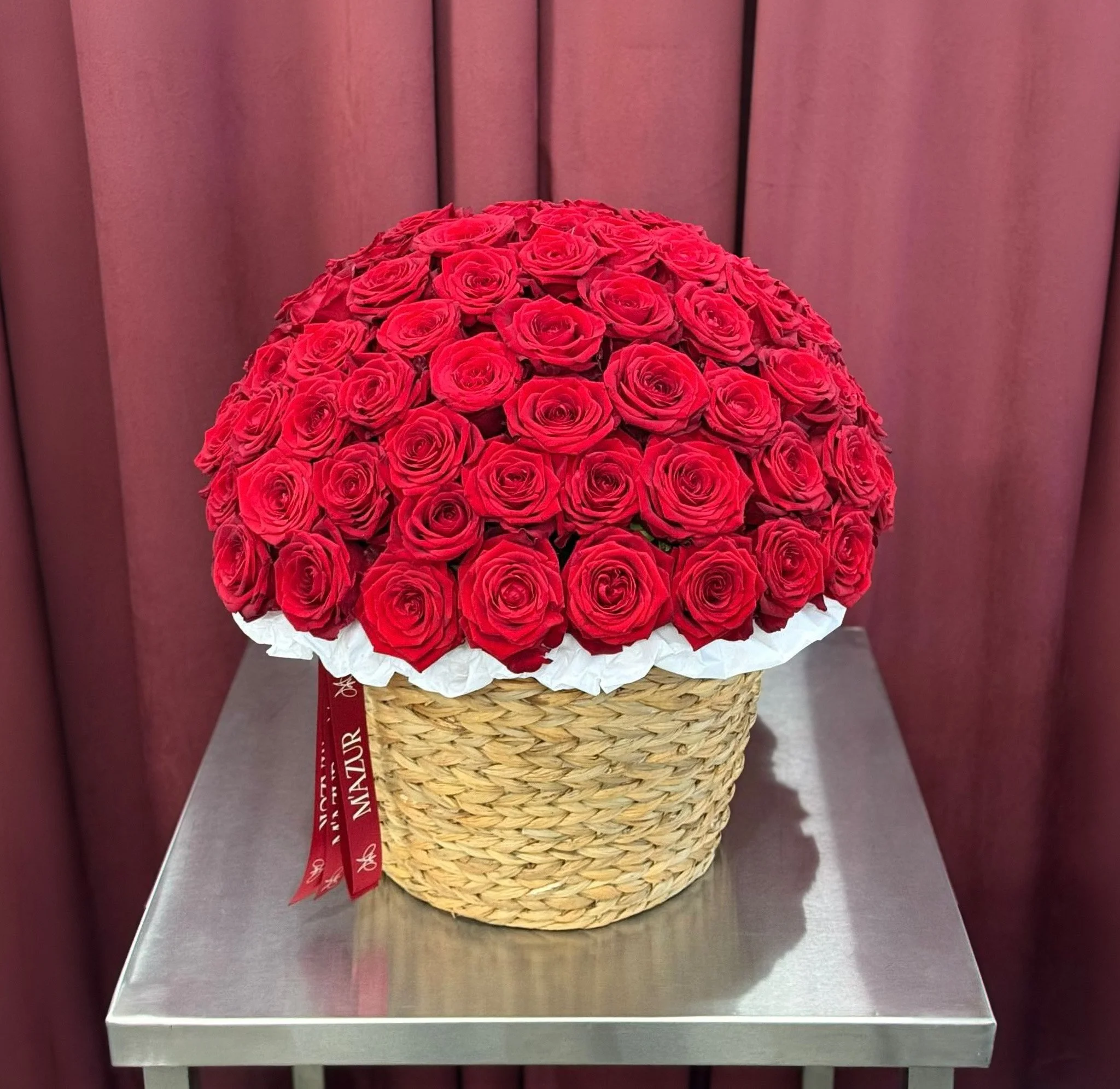 80 roses in a basket