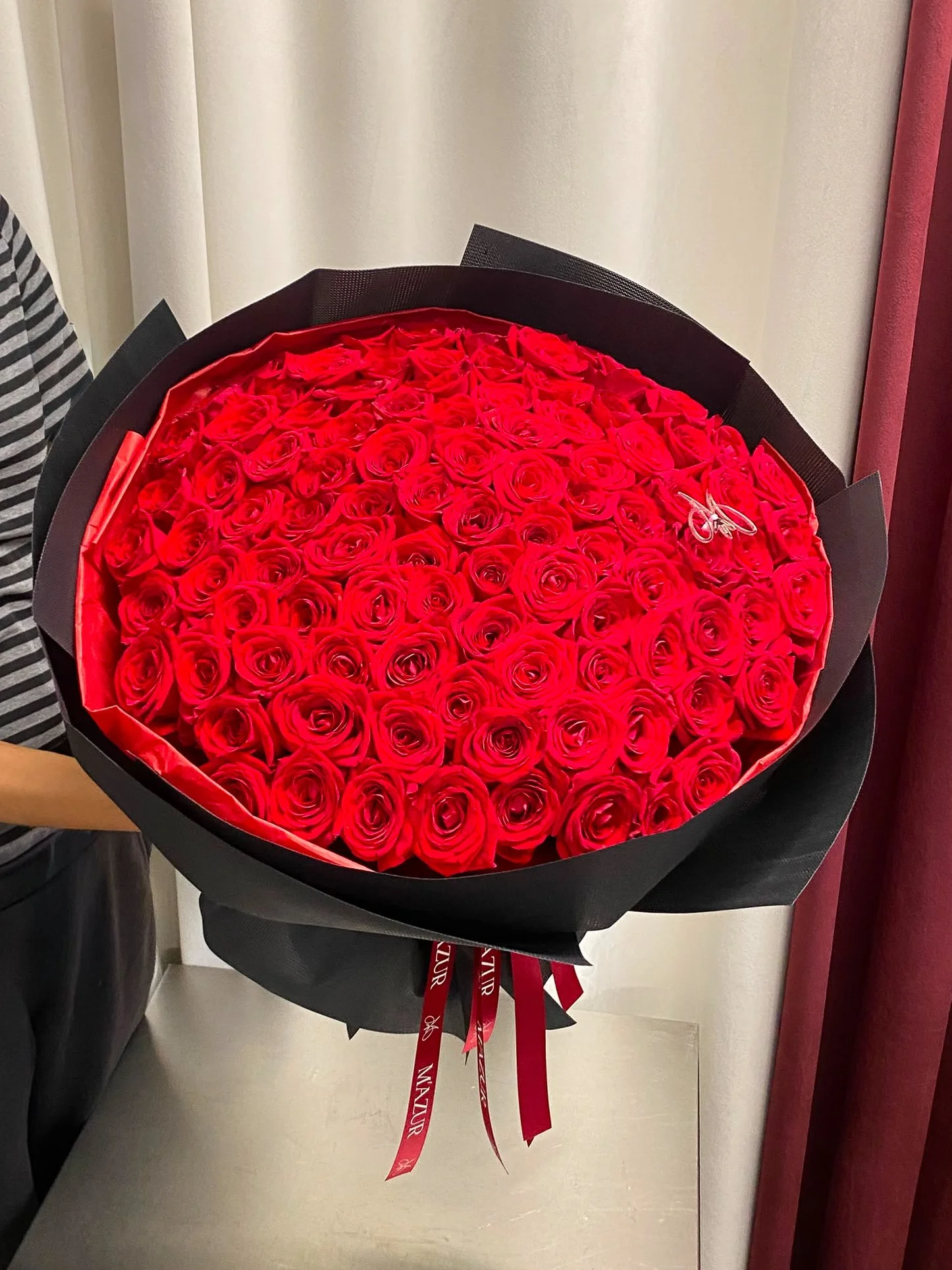 Roses in black packaging