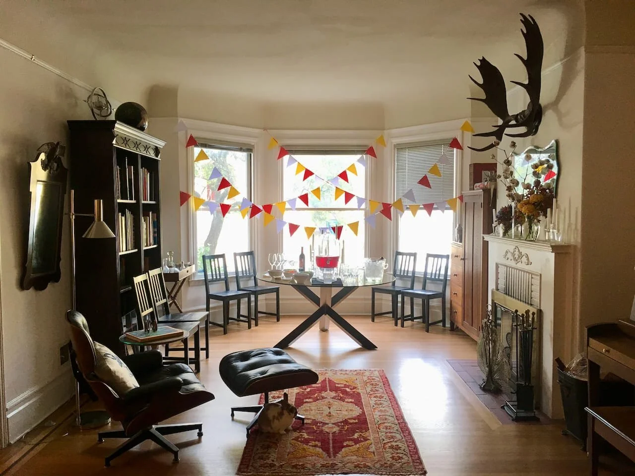 Living room decorated for a birthday party. Table from EQ3, bookshelf from Craigslist