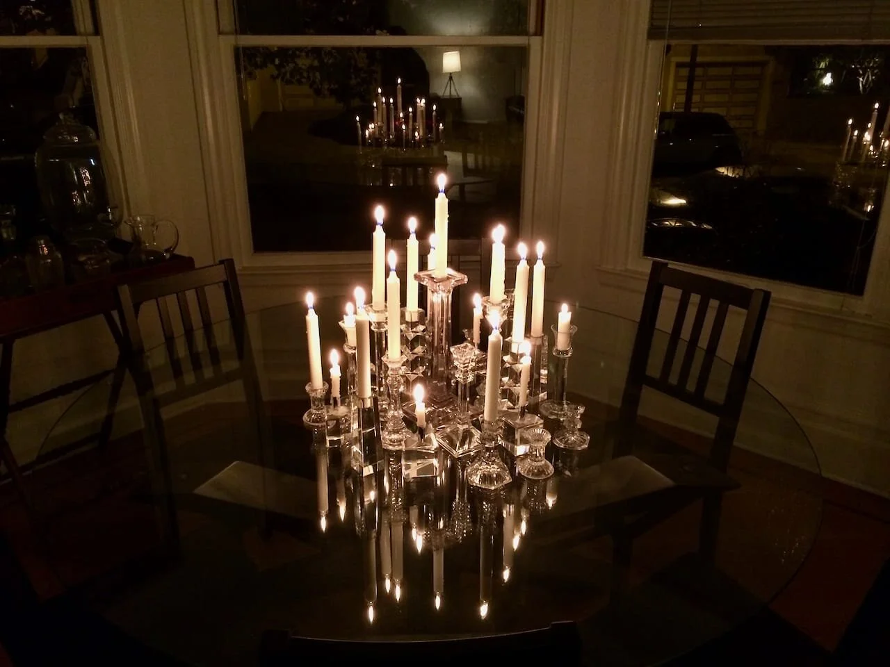Tablescape of different crystal candlesticks, various sources