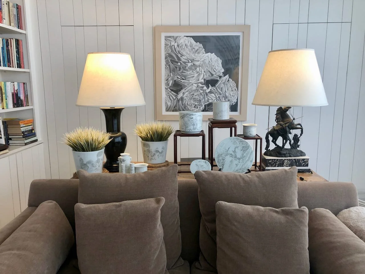 Console table is antique English country pine refectory table, circa 1840. Left lamp was custom made from Chinese vase, right lamp custom made from a French desktop statue, circa 1800. Collection of Chinese Porcelain grisaille with animals, figures,…