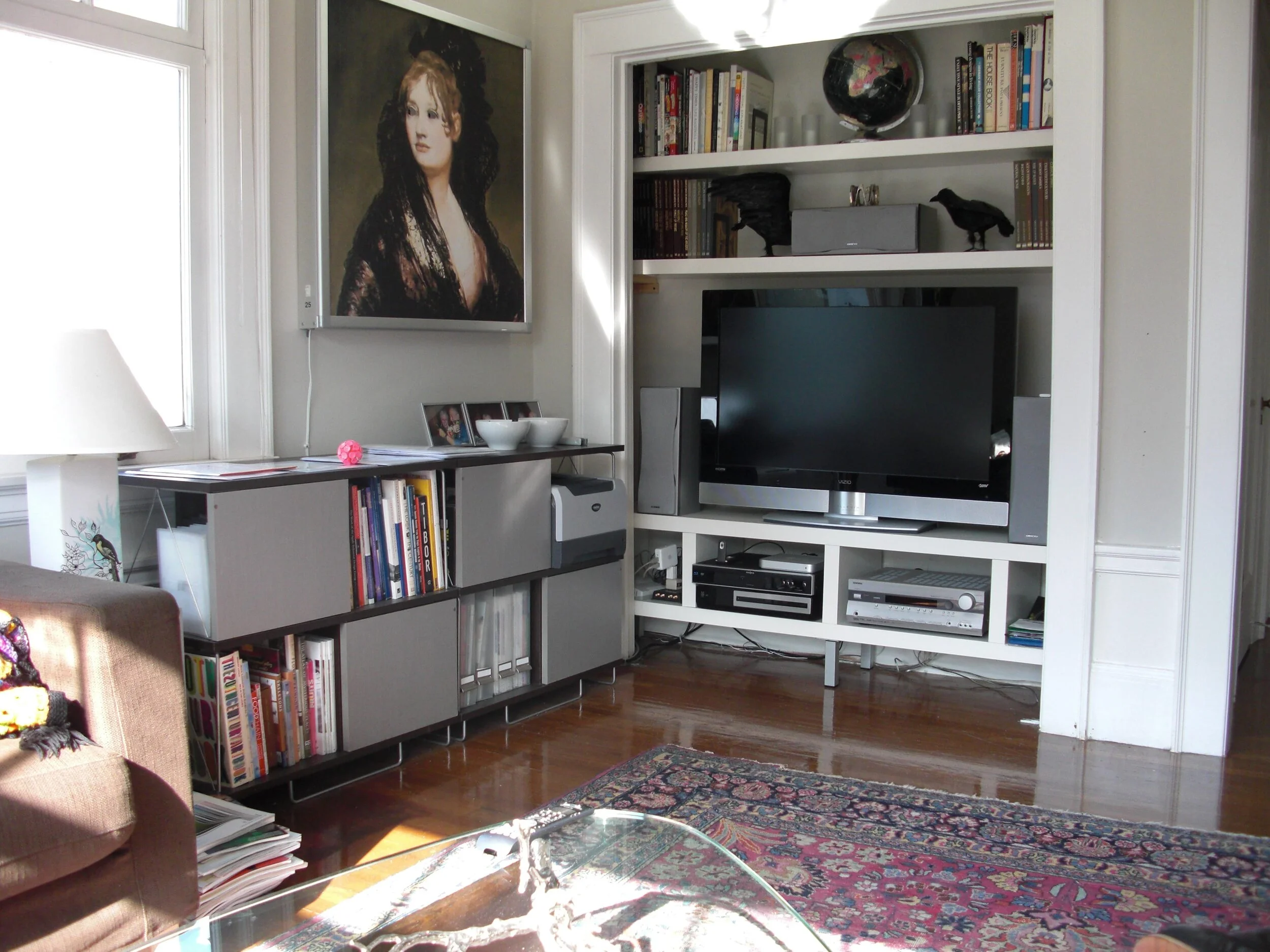Noguchi coffee table, vintage Persian rug and console table found on Craigslist