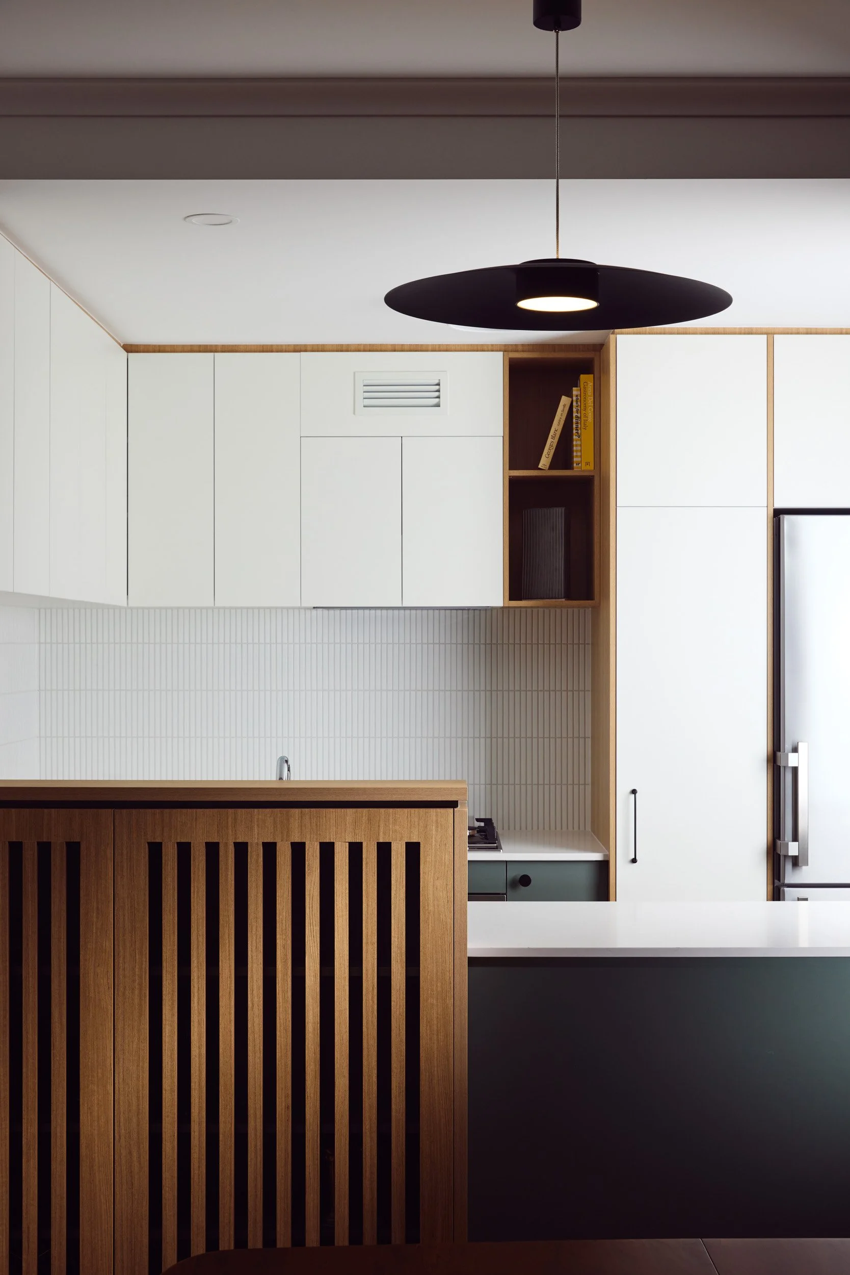 White timber and green kitchen