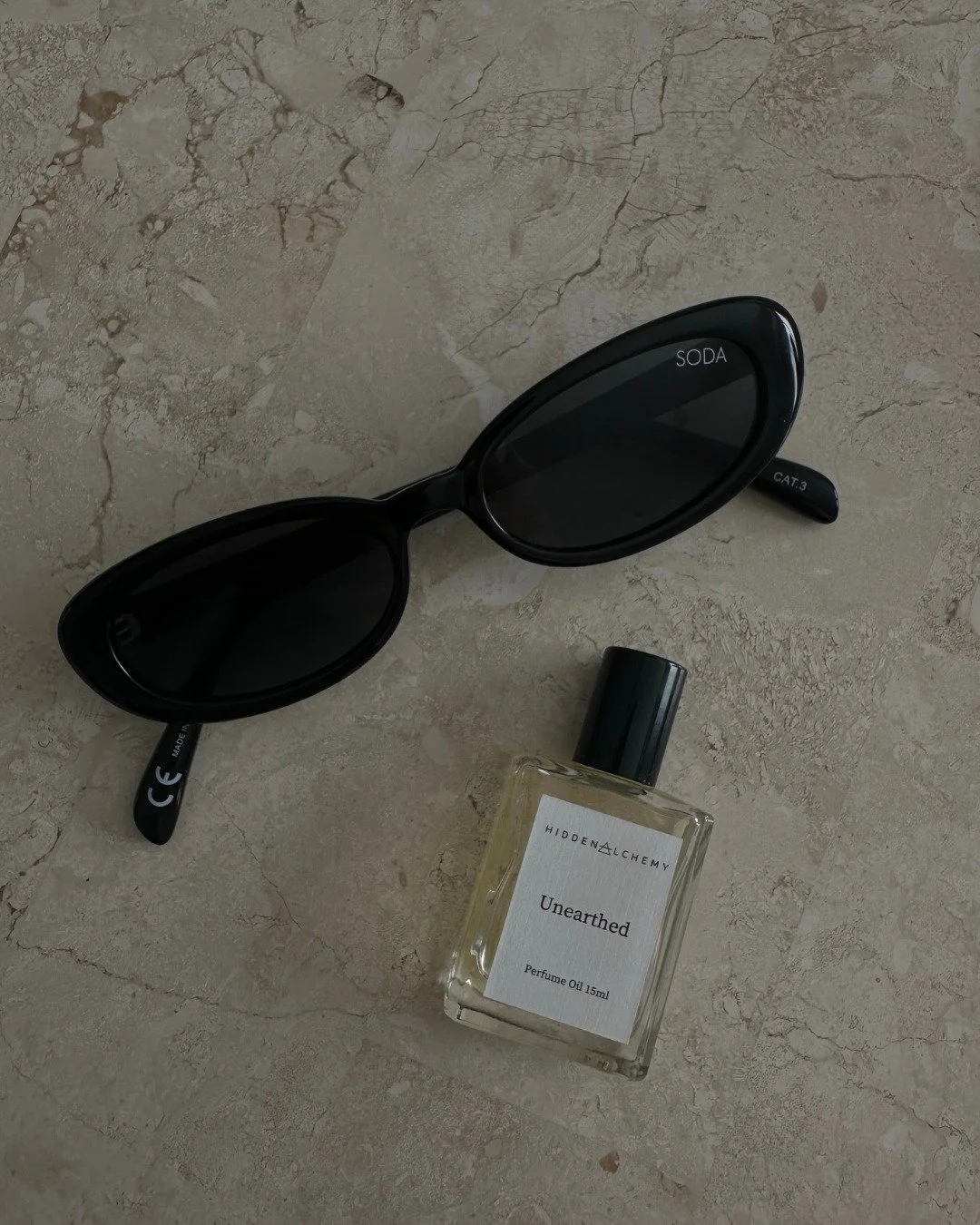 Your bag essentials are showing. And honestly, we respect it.

Sunglasses and Unearthed, the only two things you actually need before you leave the house.

Jasmine. Frangipani. A little musk. A lot of confidence. 🕶️