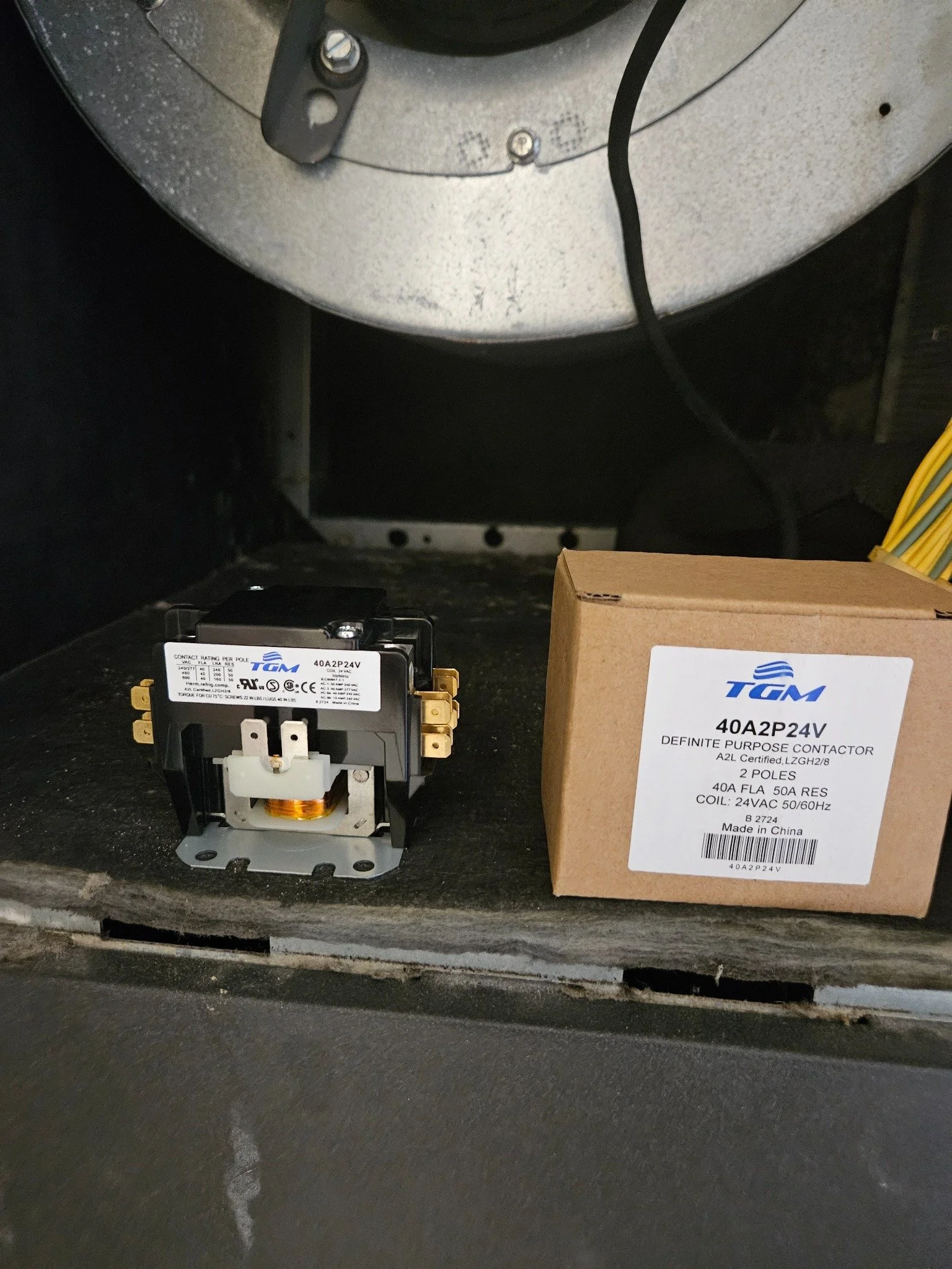 Contactor replacement during the geothermal AC repair in North Miami, Florida.
