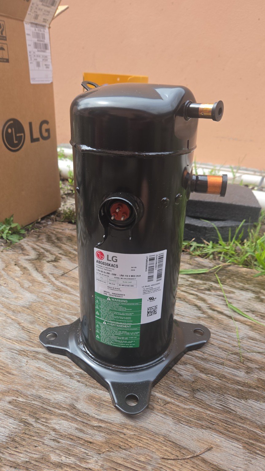 Replacement compressor for the Ruud AC warranty repair in Plantation, Florida.