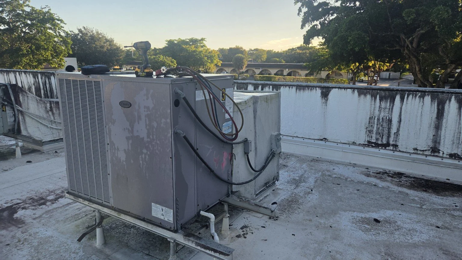 Commercial rooftop package AC unit serviced for a failed compressor in Plantation, Florida.