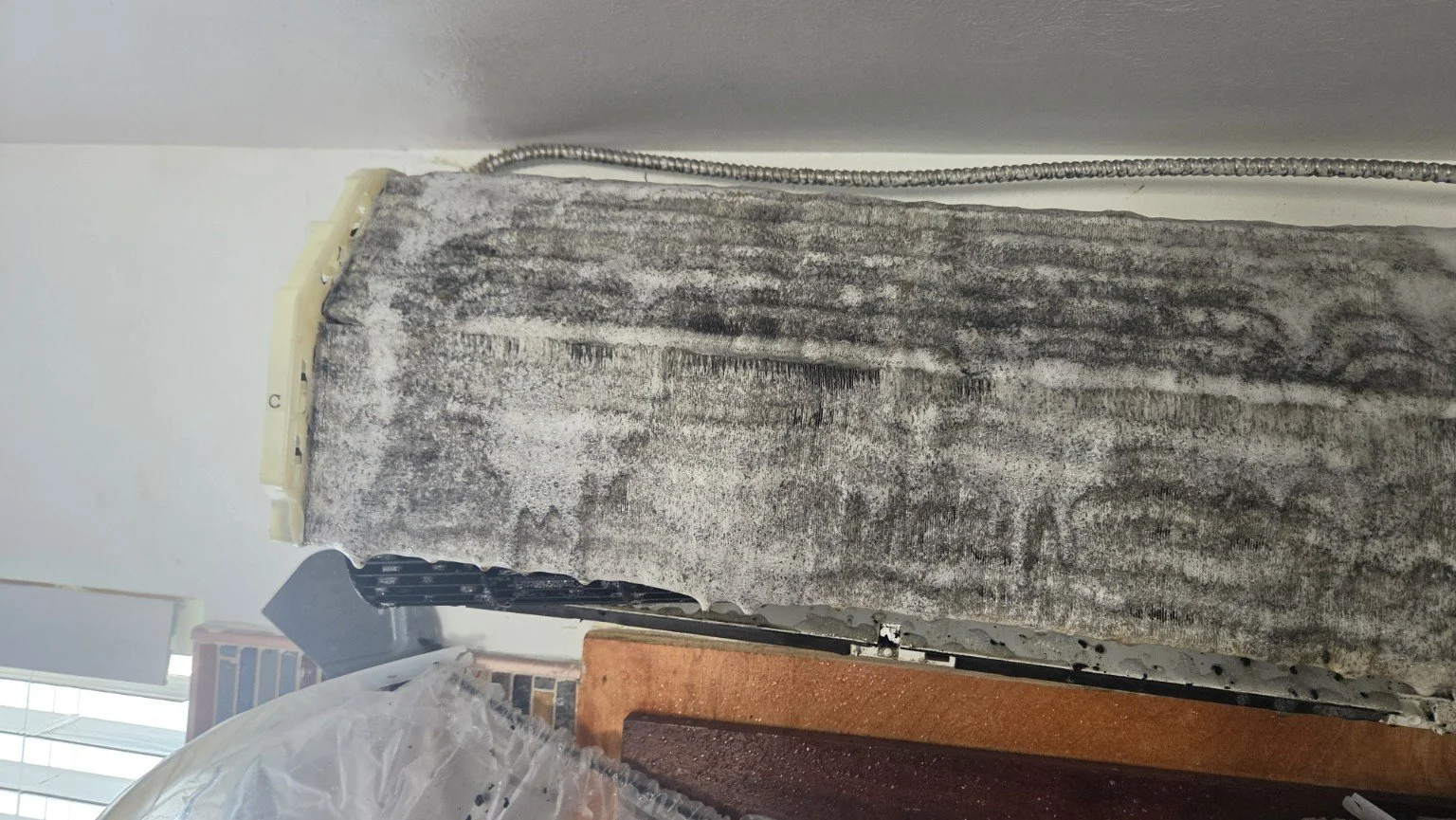 Mini-split evaporator coil during cleaning in Fort Lauderdale, Florida.