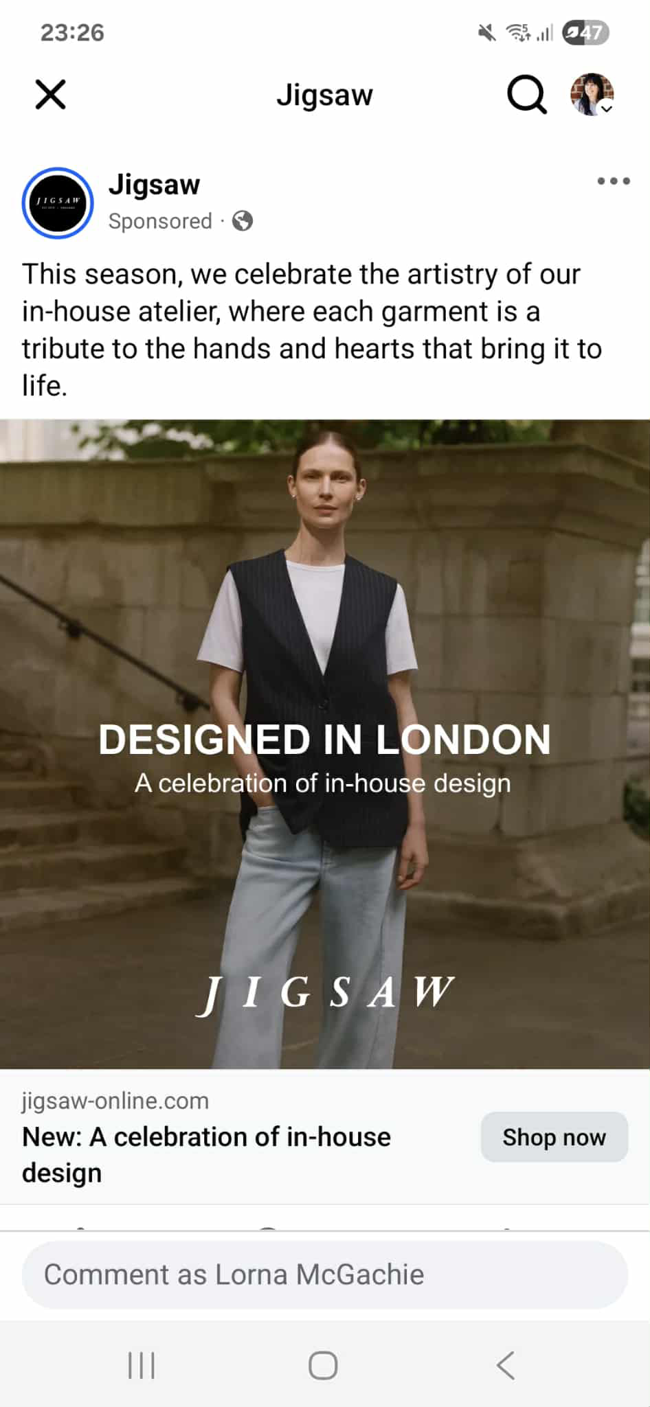A female model wearing relaxed light-denim jeans, a plain white short-sleeve t-shirt and a relaxed v-neck sleeveless waistcoat in brown