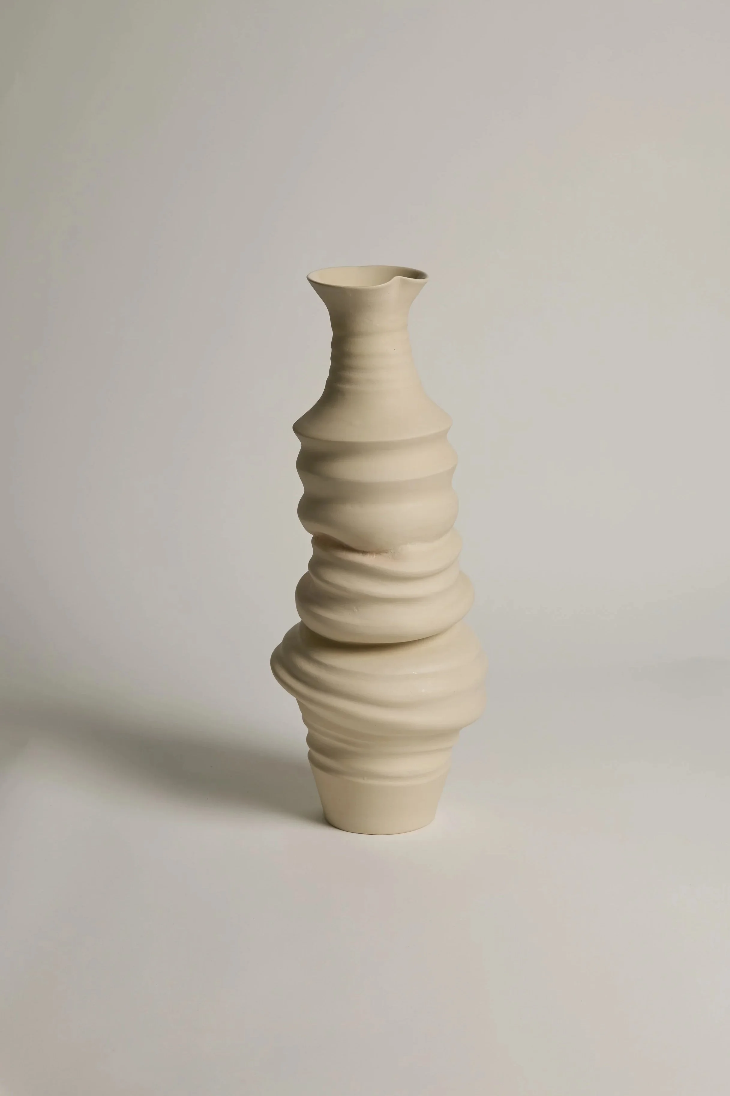 Abstract ceramic sculpture by Melbourne ceramic artist Alyssa Nuttall. Organic form inspired by erosion and changing coastal landscapes.