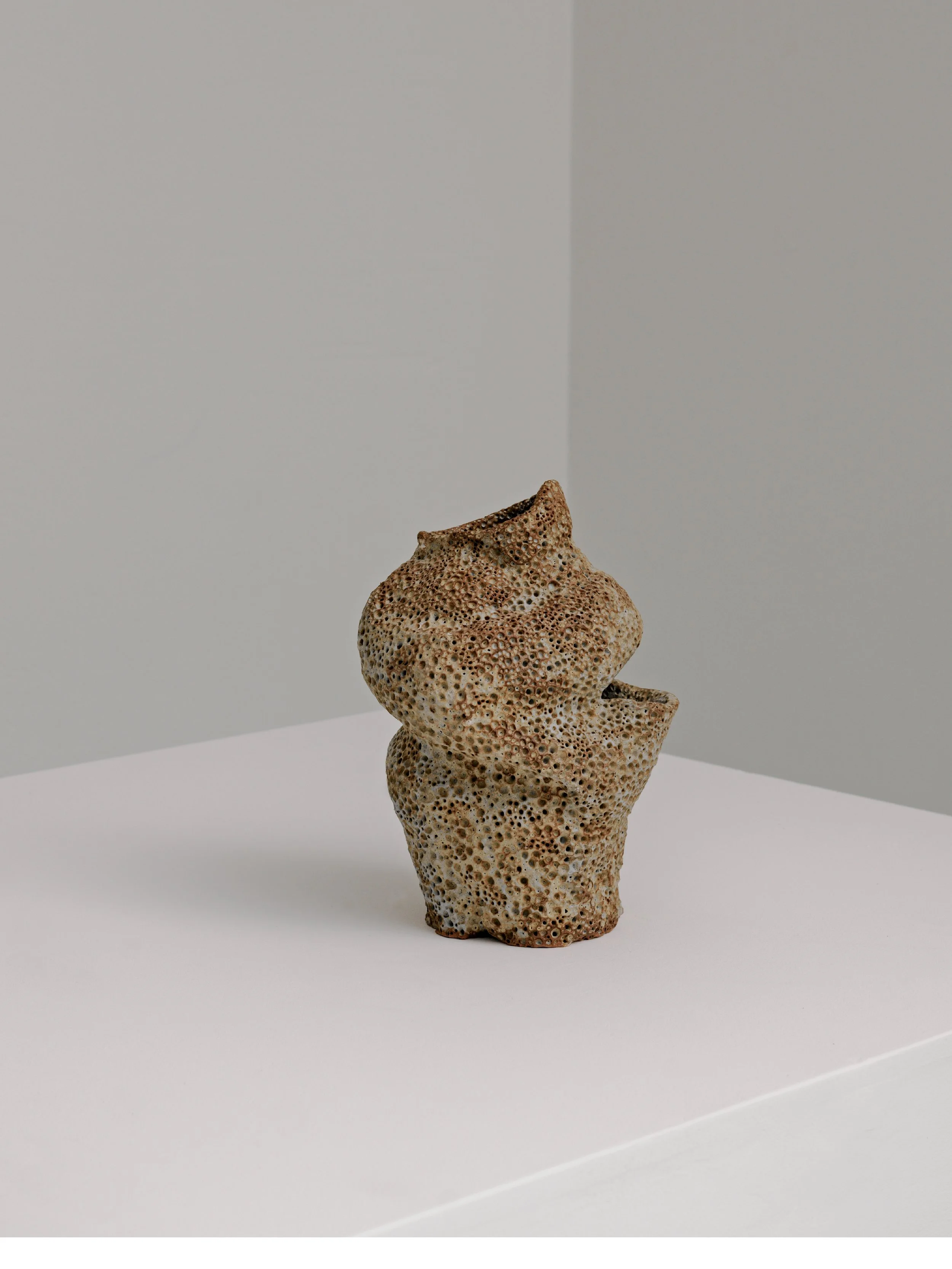 Hand-textured ceramic sculpture by Melbourne ceramic artist Alyssa Nuttall, featuring an abstract organic form inspired by coral and natural ecosystems.