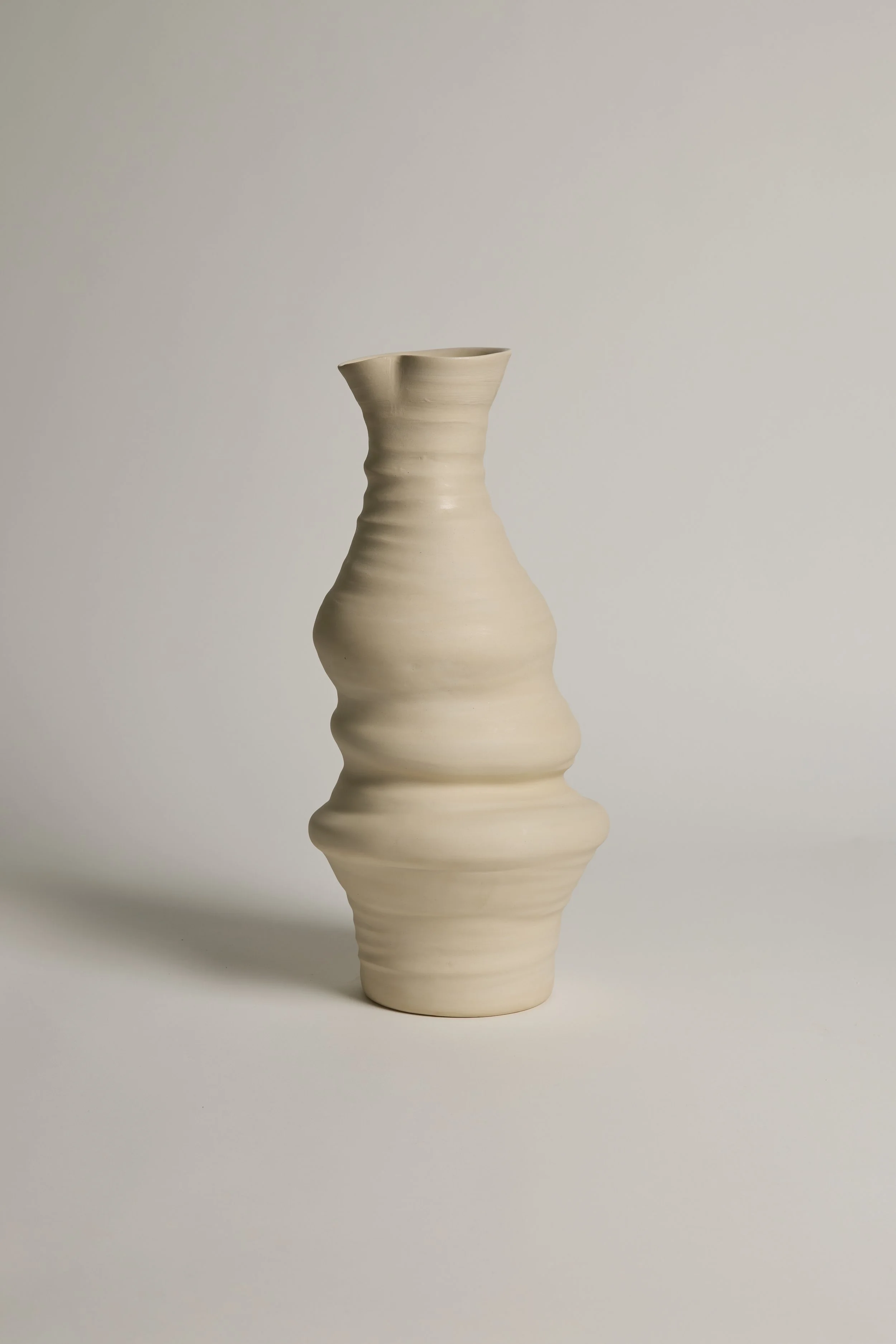 Abstract ceramic sculpture by Melbourne ceramic artist Alyssa Nuttall. Organic form inspired by erosion and changing coastal landscapes.