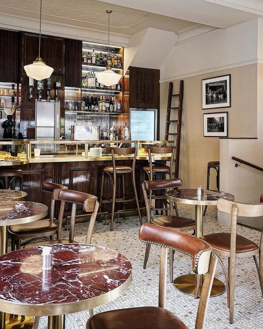 Baudry Greene as seen from the corner table. We&rsquo;re quite taken with the new photographs on the wall which show Endell Street as it was way-back-when.

📸 @annaambrosi.interiordesign