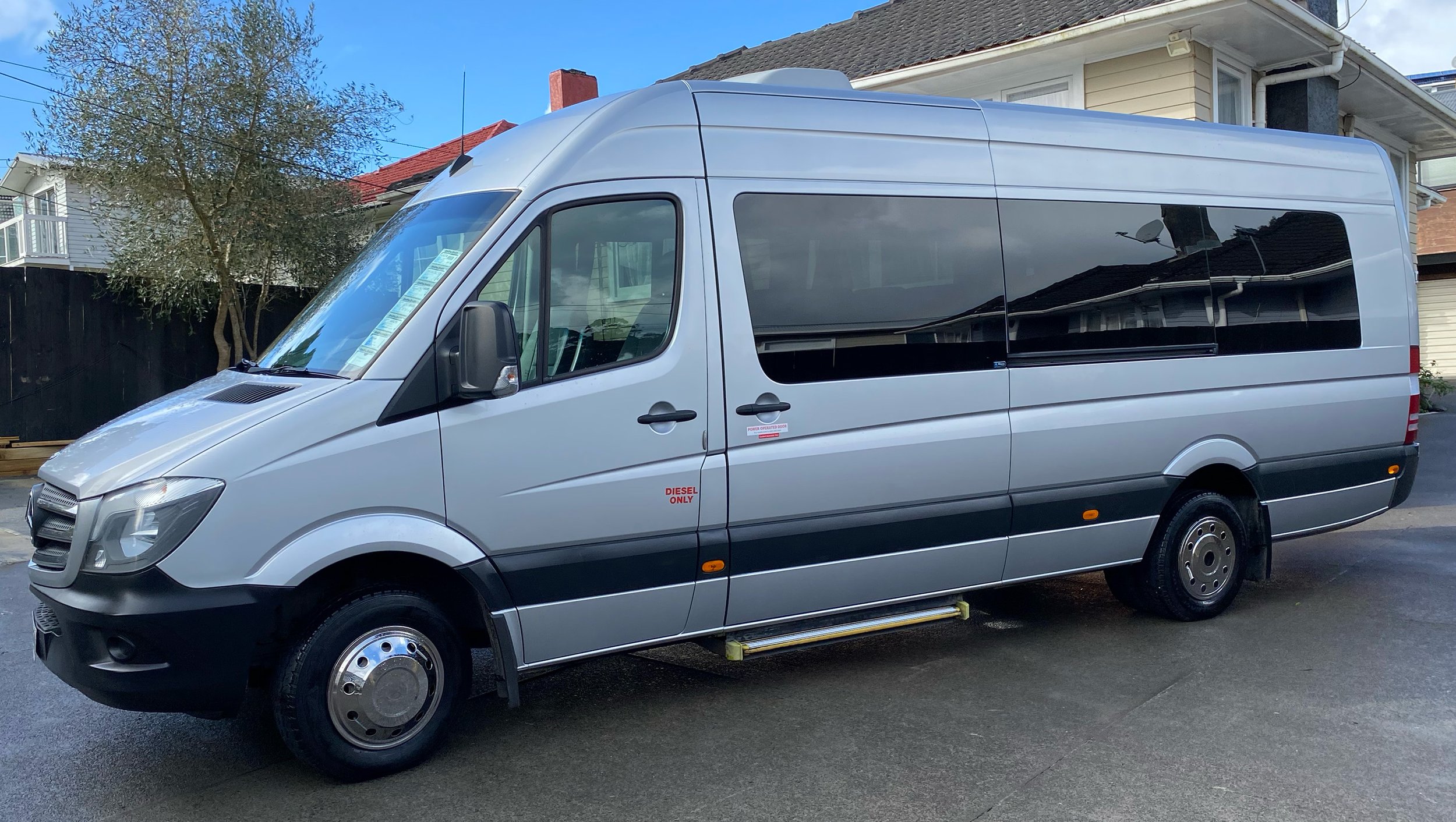 YourNZDriver 15 seater Sprinter 519CDI front left.jpg