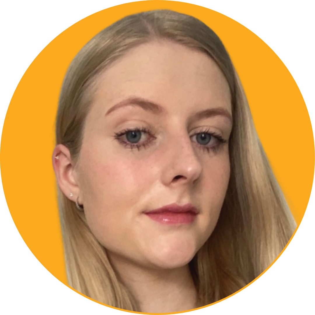 Close-up of a woman with blonde hair and blue eyes against a yellow background.