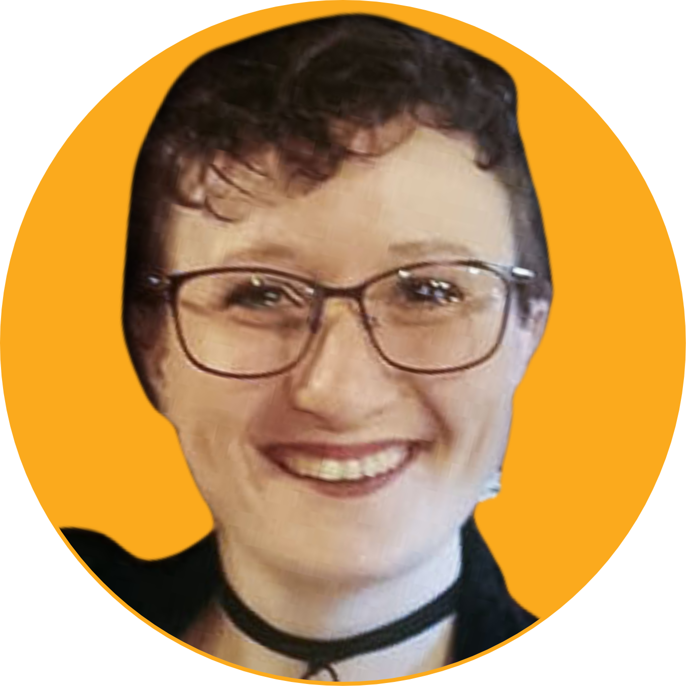 Smiling woman with short curly hair, glasses, and a choker necklace, against an orange background.