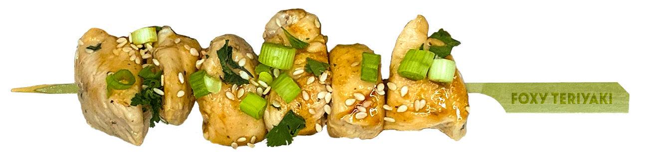 Foxy Teriyaki chicken skewer garnished with sesame seeds, green onions, and cilantro