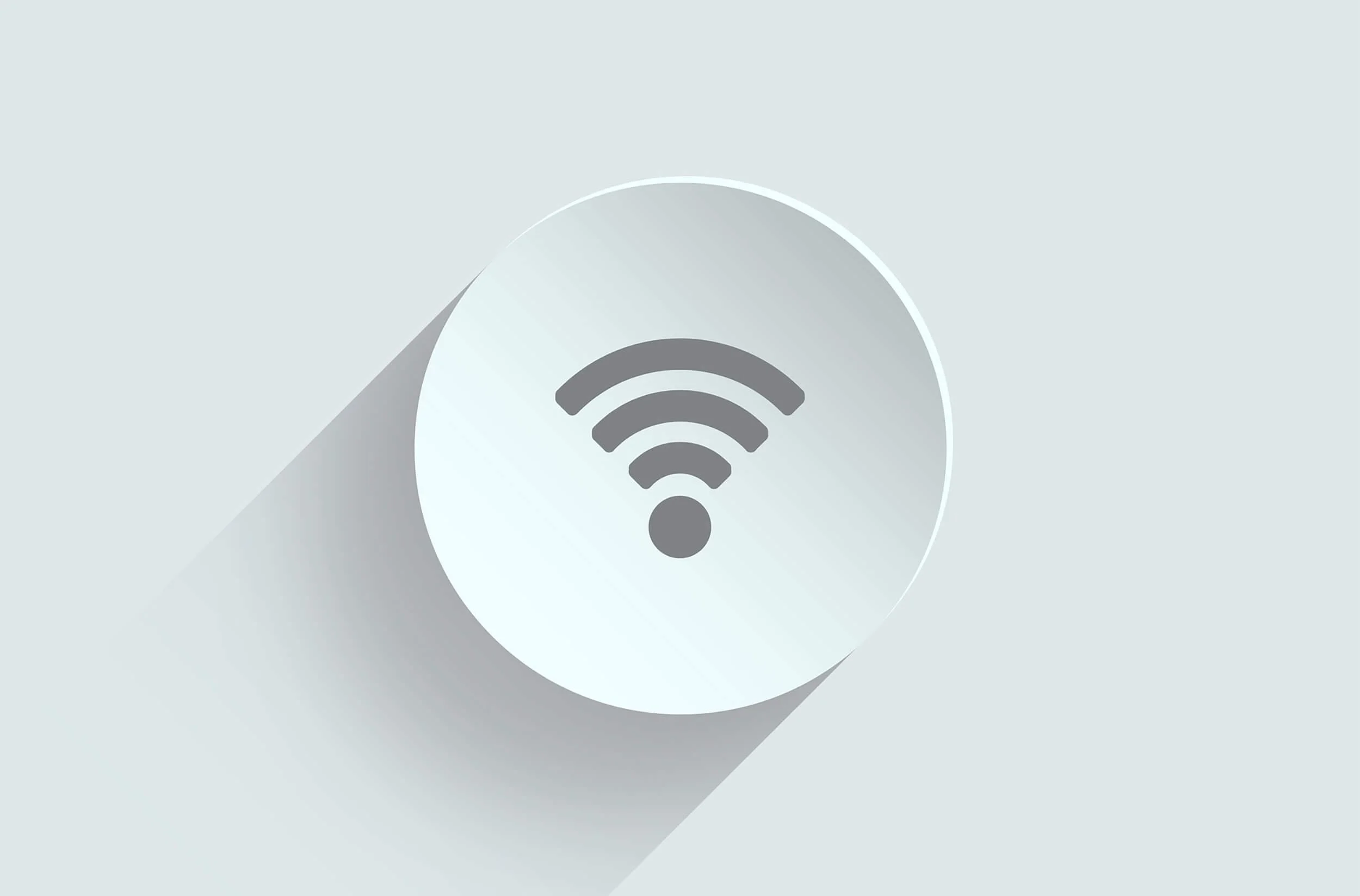 Wi-Fi symbol on a light gray background with a shadow effect.