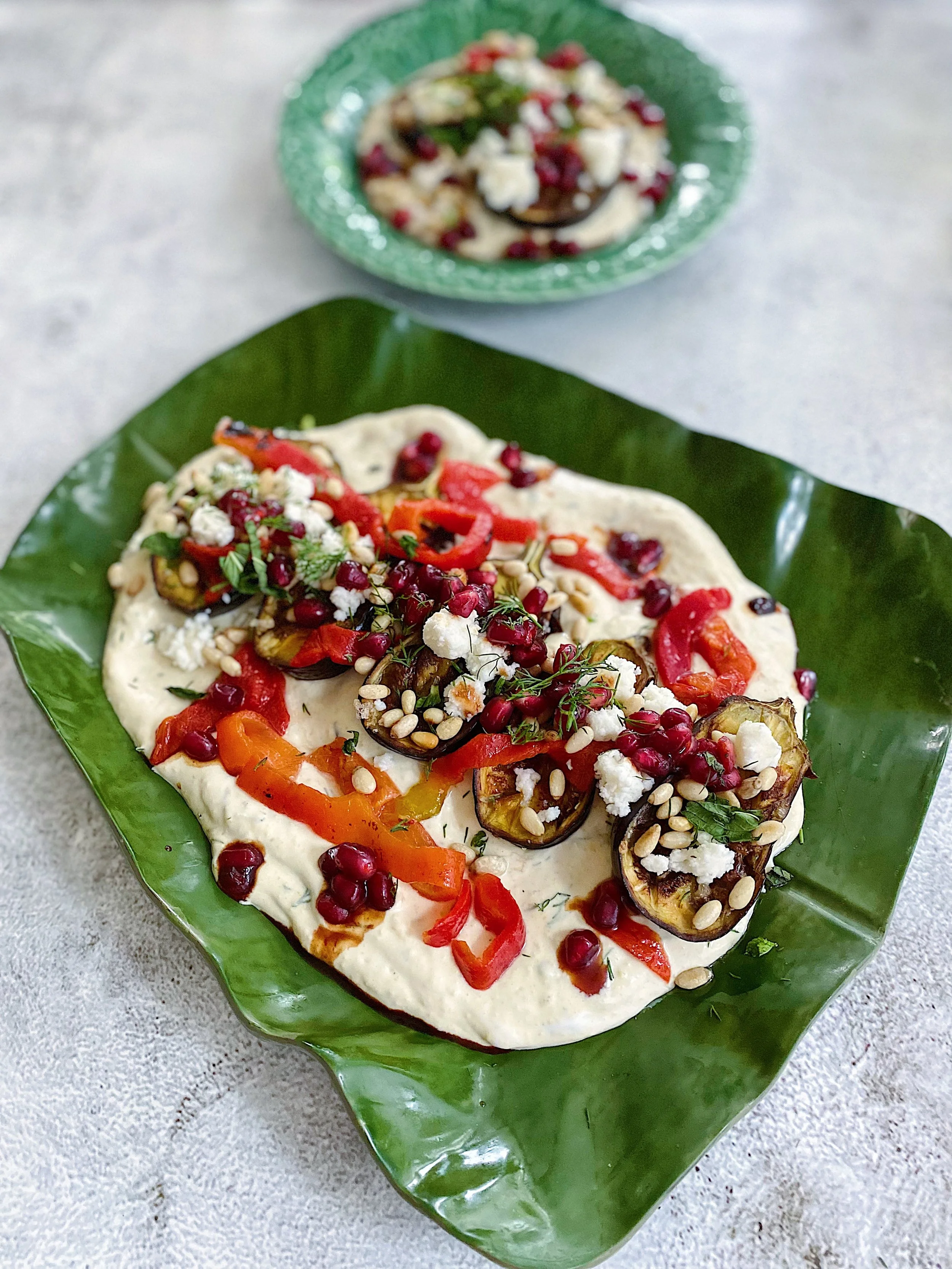 Baked Baby Aubergine with herb hummus &amp; pomegranate molasses