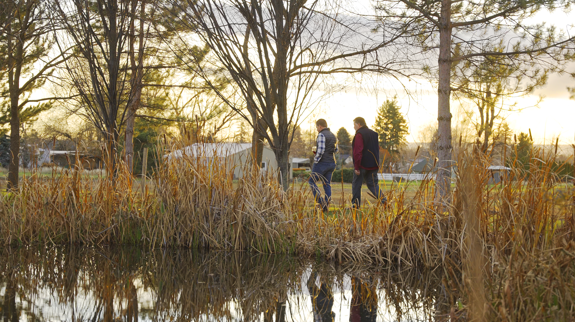 gary.chris.walking.pond.png