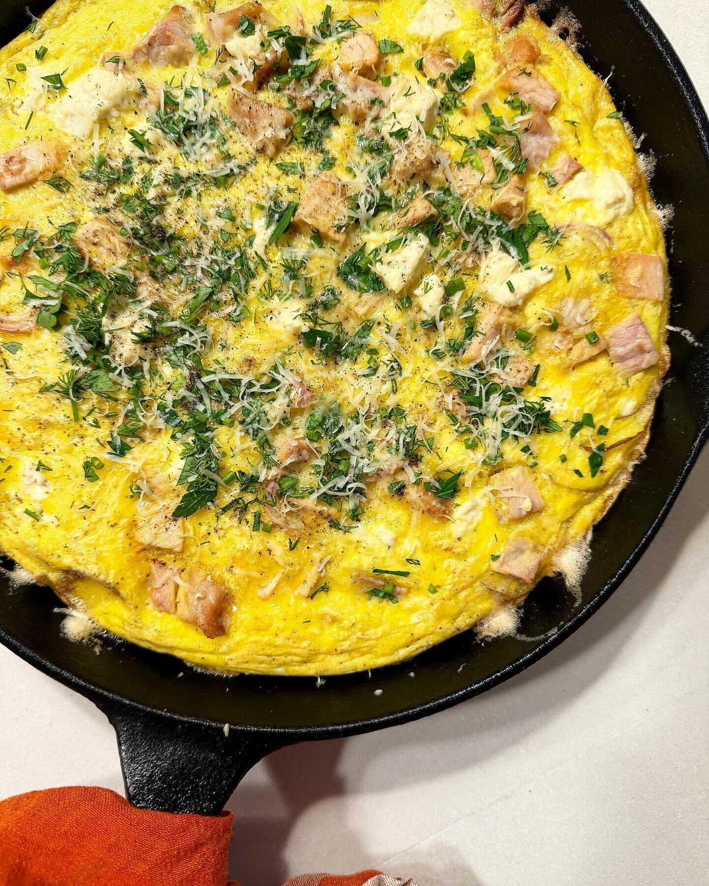 Frittatas are a great use of leftovers! 

The bottom is layered with some of those Yukon Gold potatoes we harvested this past summer. Then we mixed up our farm fresh eggs with our lightly smoked ham (nitrate free), garden shallots and Boursin cheese.