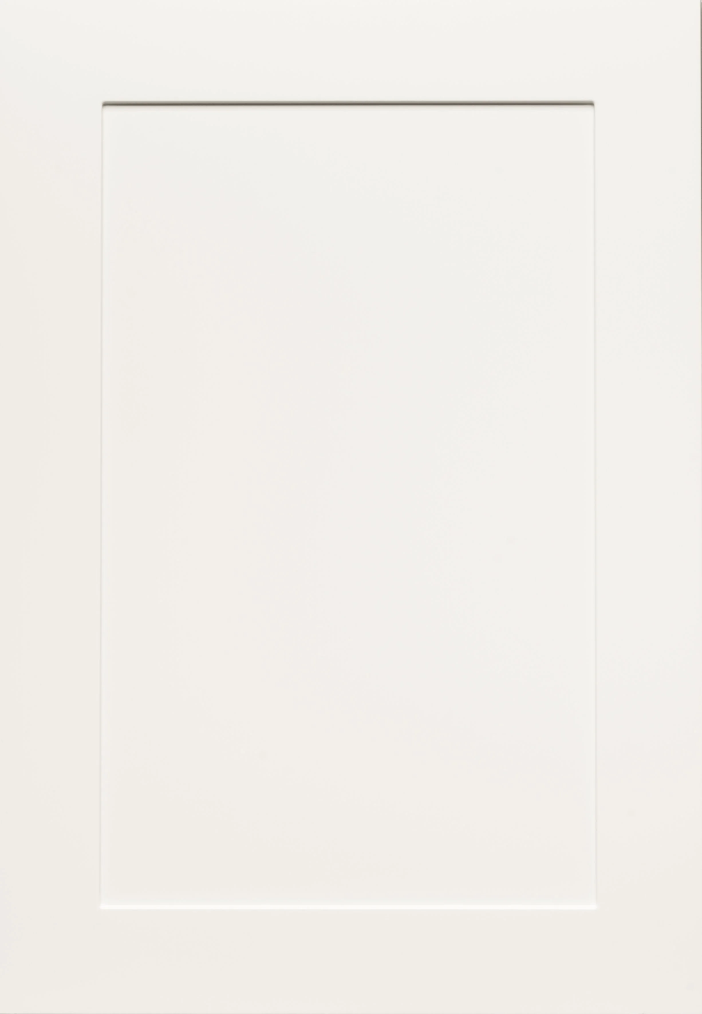 Minimalist white wooden cabinet door with a simple square design.