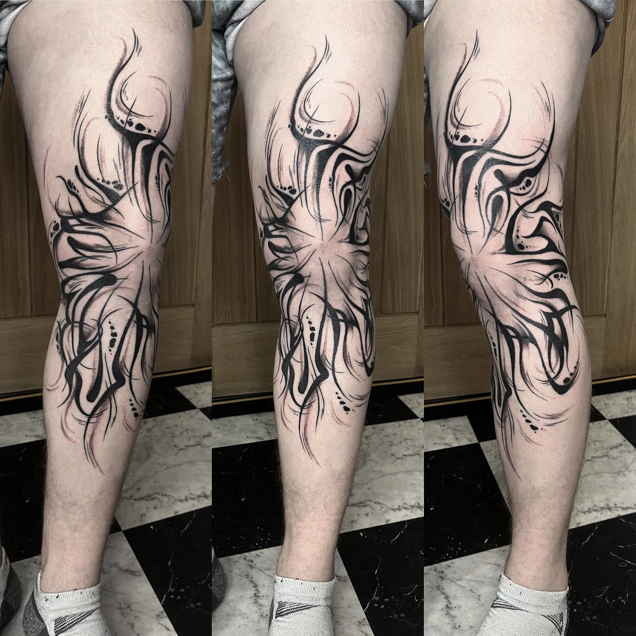 abstract-knee-tattoo-dark-script.jpg