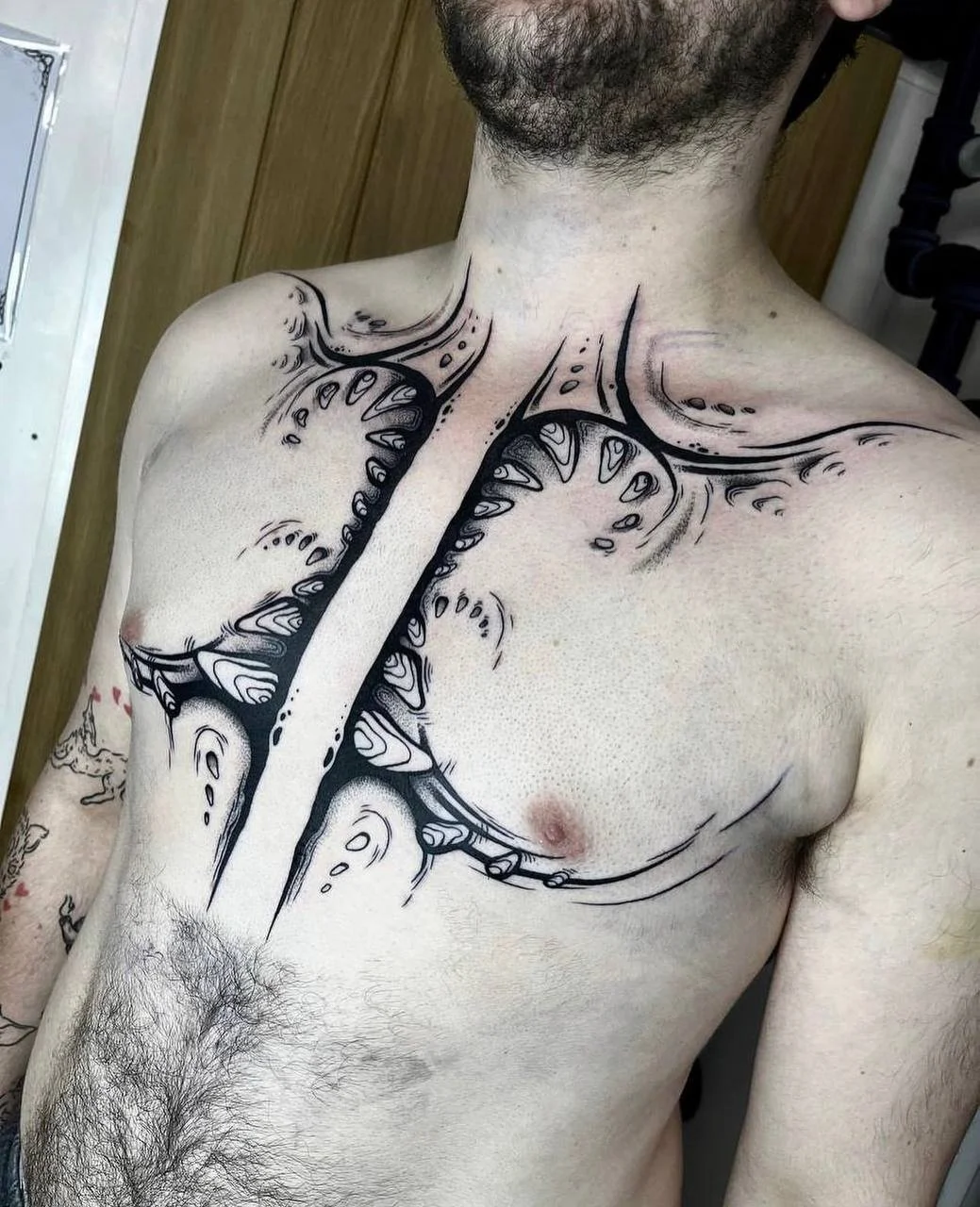 abstract-chest-tattoo-polymorph-blackwork.JPG