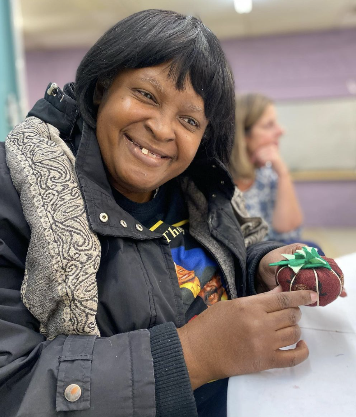 University Settlement senior with pin cushion