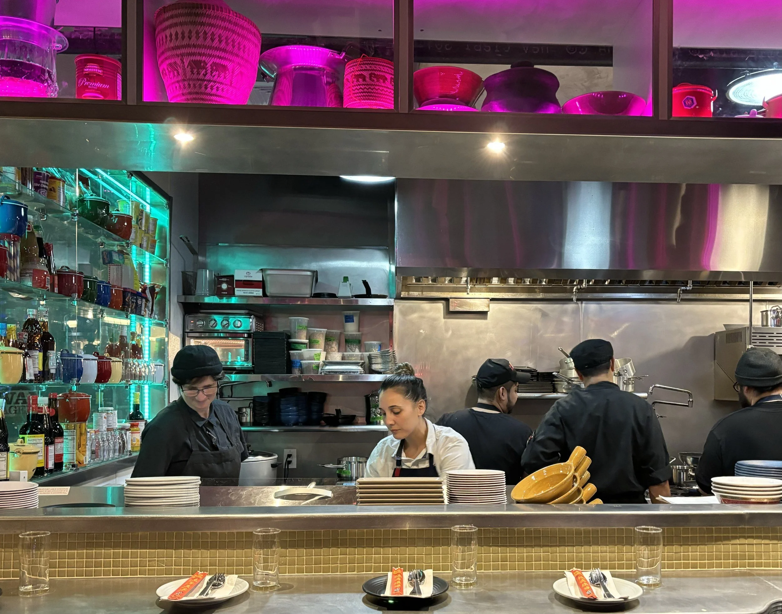 Leah Cohen working the open kitchen at Pig and Khao on the Upper West Side