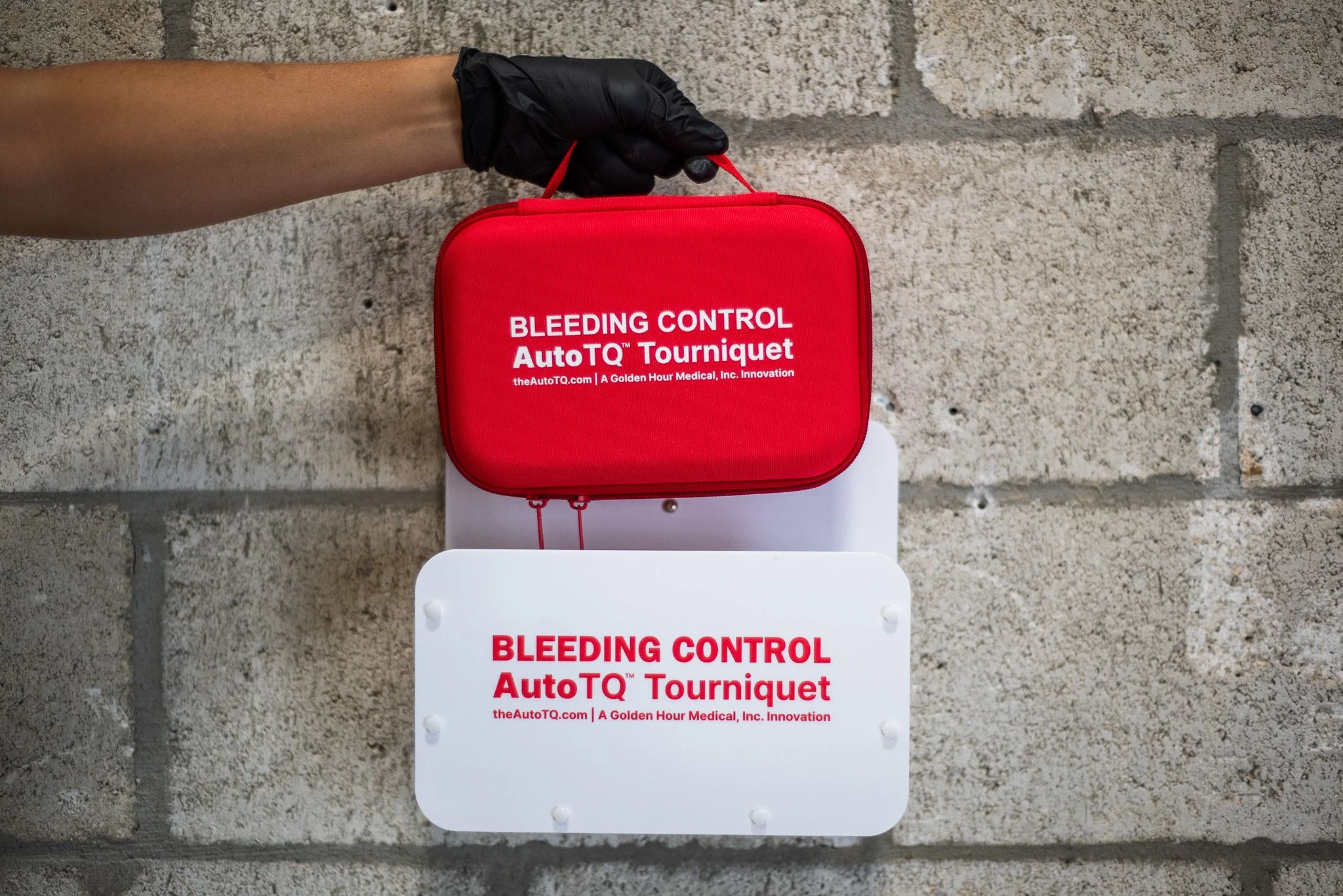 AutoTQ mounted on a wall bracket.