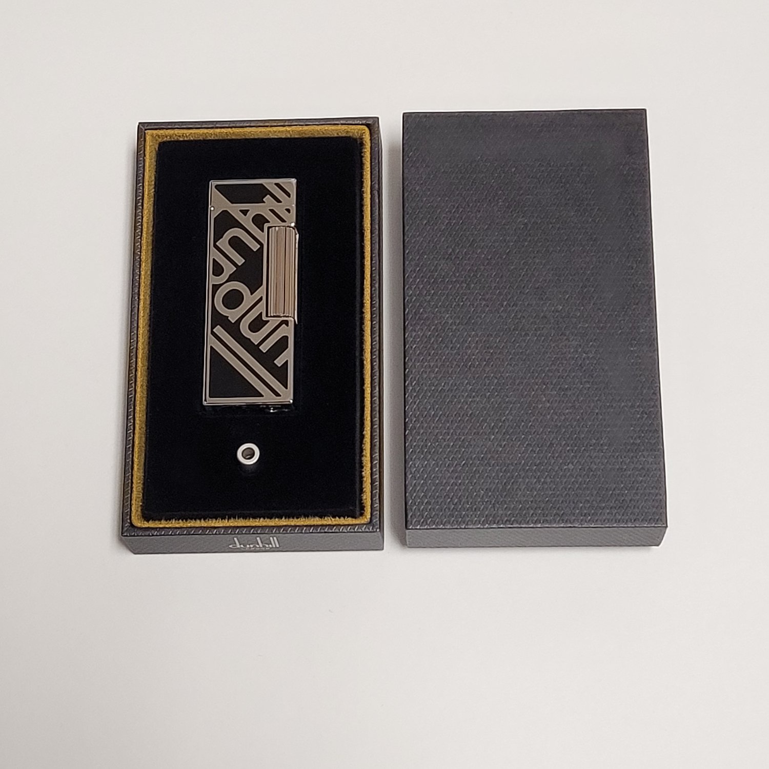 Art Deco black enamel lighter with timepiece, Cartier – Kentshire