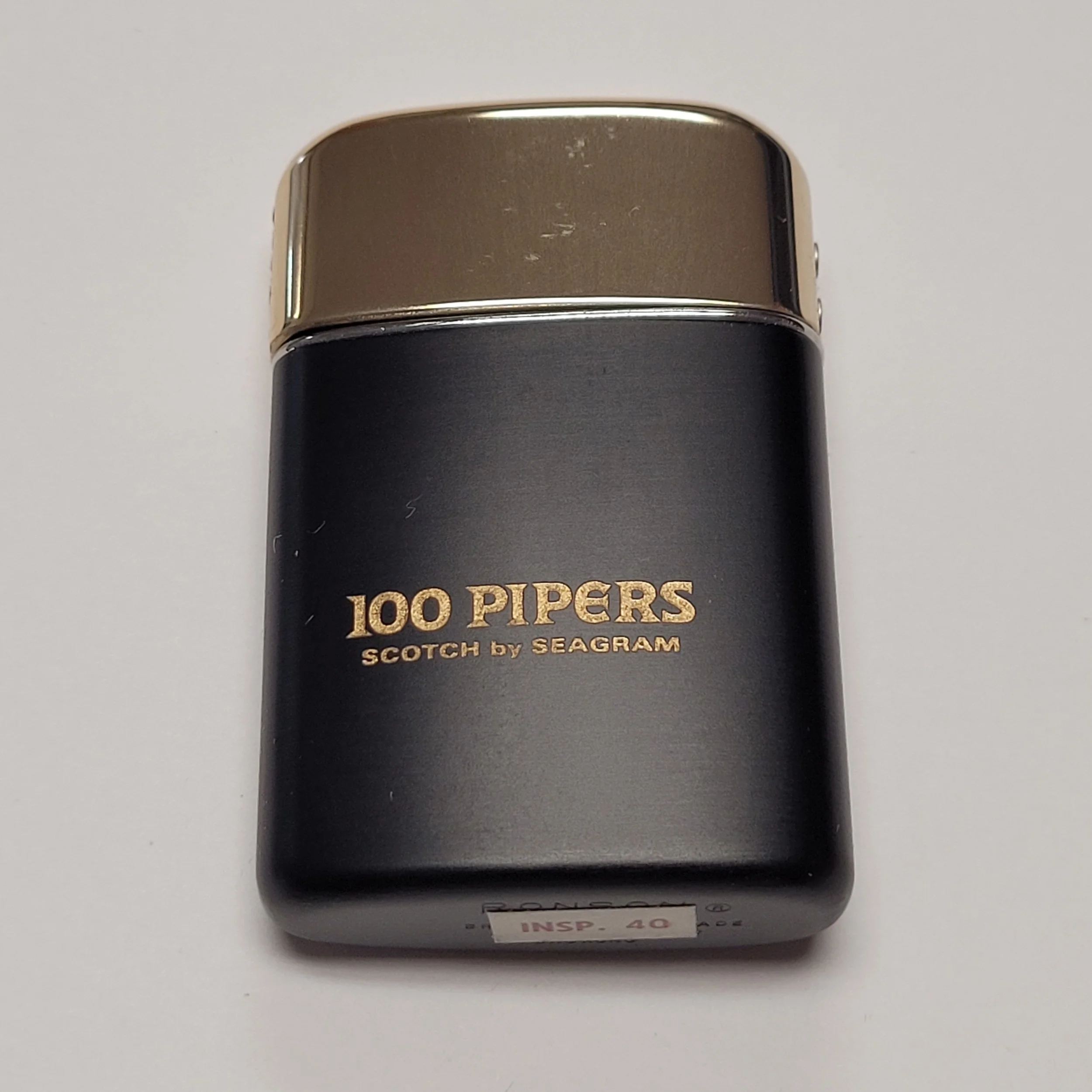 1950s Ronson Typhoon 100 Pipers Seagram Scotch Lighter