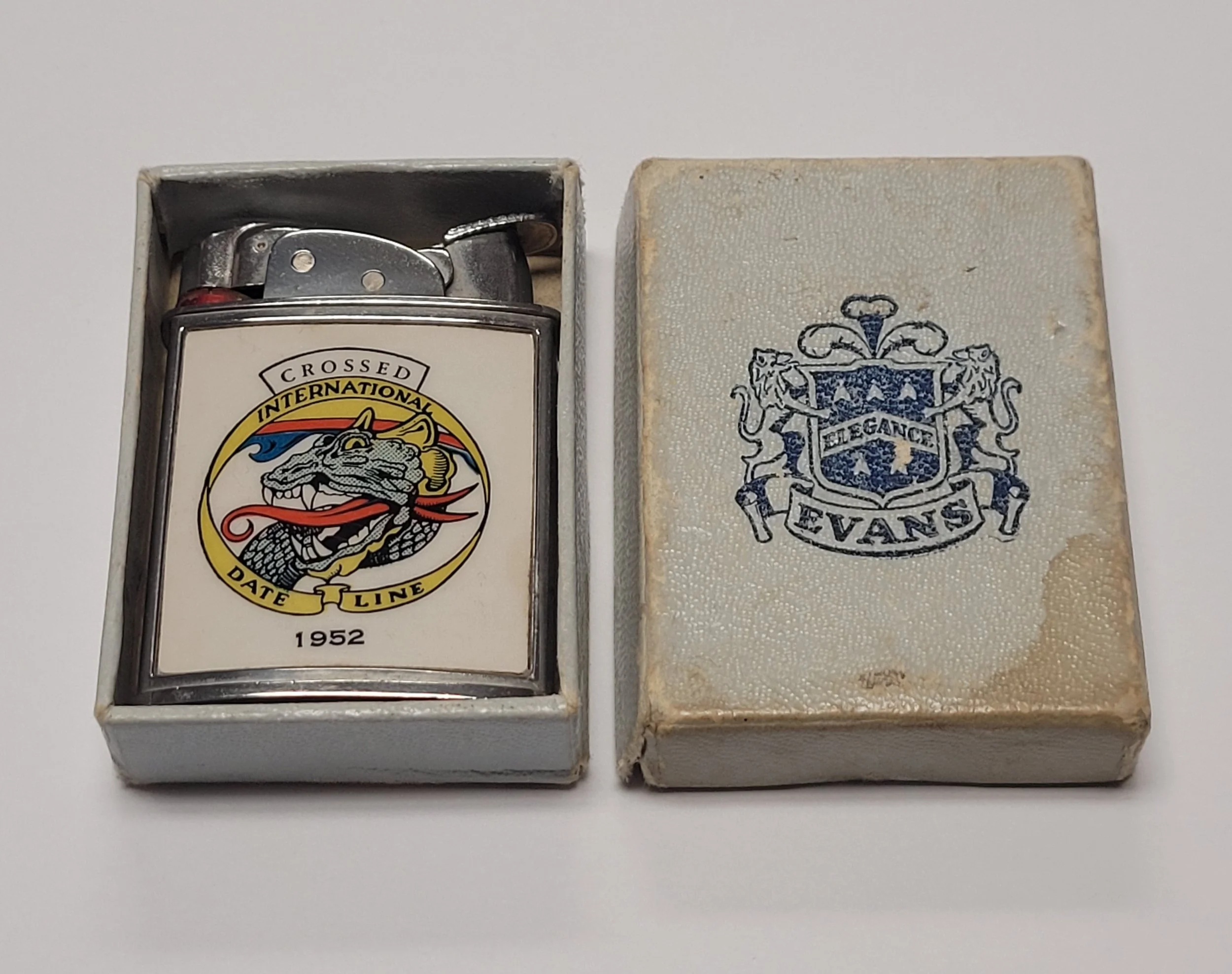 1950s Evans Banner Crossed International Date Line Lighter