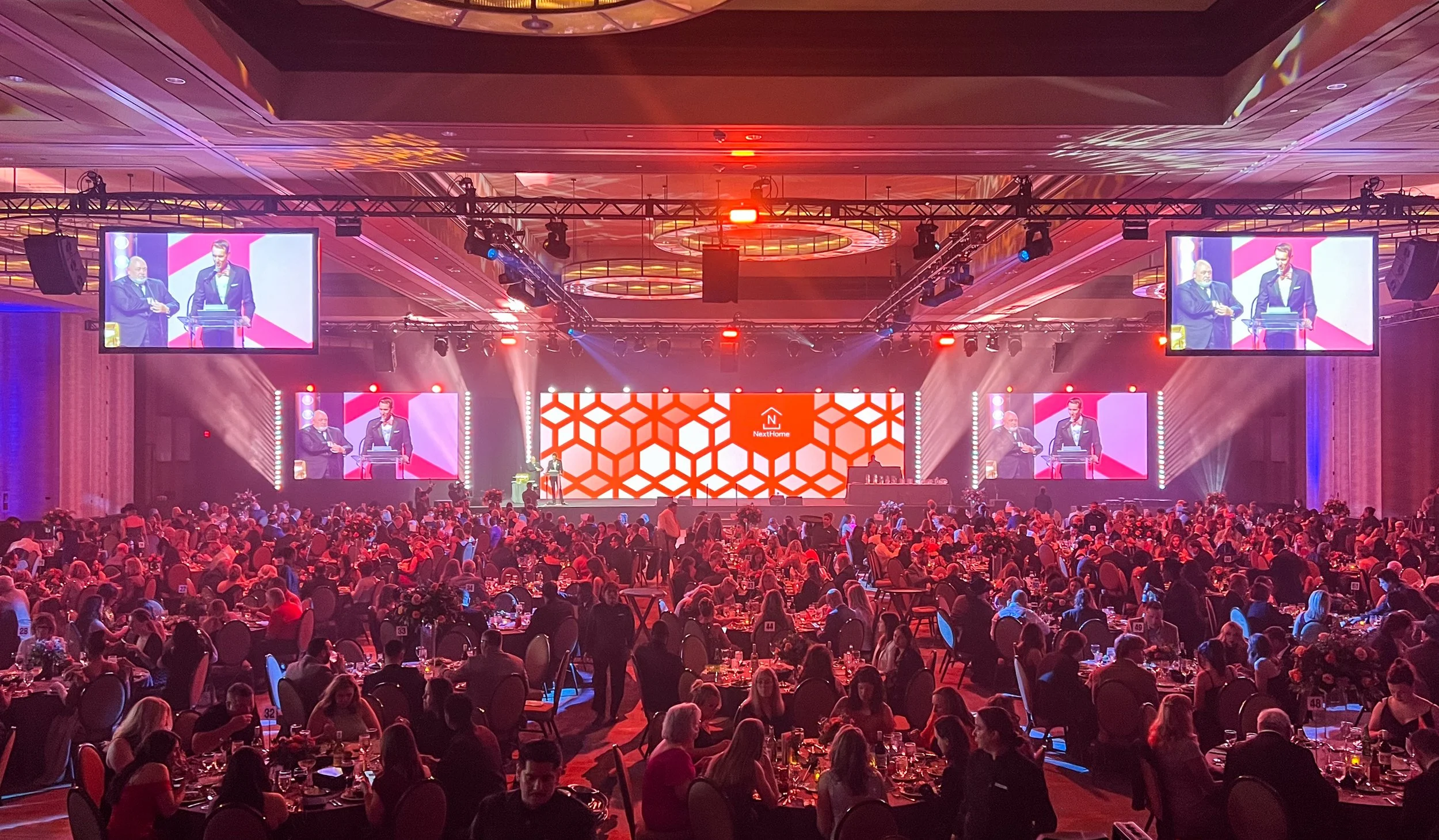 Beautiful LED wall with complimentary lighting, delay screens, and grid style rigging plan.