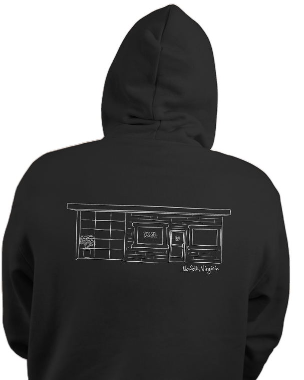 Black hoodie with a white line drawing of a storefront labeled 'Vessel' and the text 'Norfolk, Virginia' underneath.